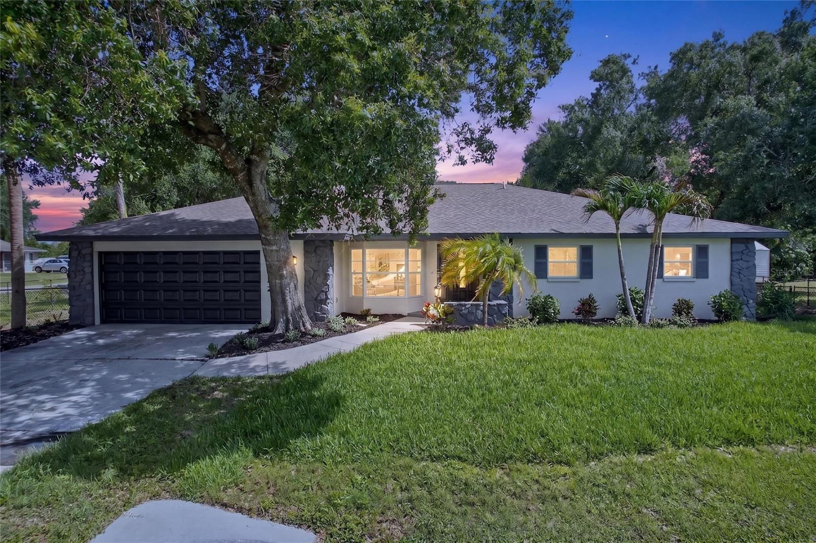 Fall in love with this Port Charlotte pool home! Tucked away on an .55-acre lot with mature trees, this move-in-ready home offers privacy No HOA and a coveted No Flood Zone status. Inside, spacious living area has tile and new luxury vinyl plank flooring. The star of the show is your private, screened-in pool— new brick pavers make it a true Florida retreat right in your backyard.

Perfectly located near premier shopping, dining, medical facilities, and Charlotte Harbor, you’re also just a 30-minute drive to the beautiful Gulf waters of Englewood Beach. This charming property is an incredible opportunity for full-time living, a seasonal getaway, or a savvy investment. Schedule your tour today and step into the Florida lifestyle!