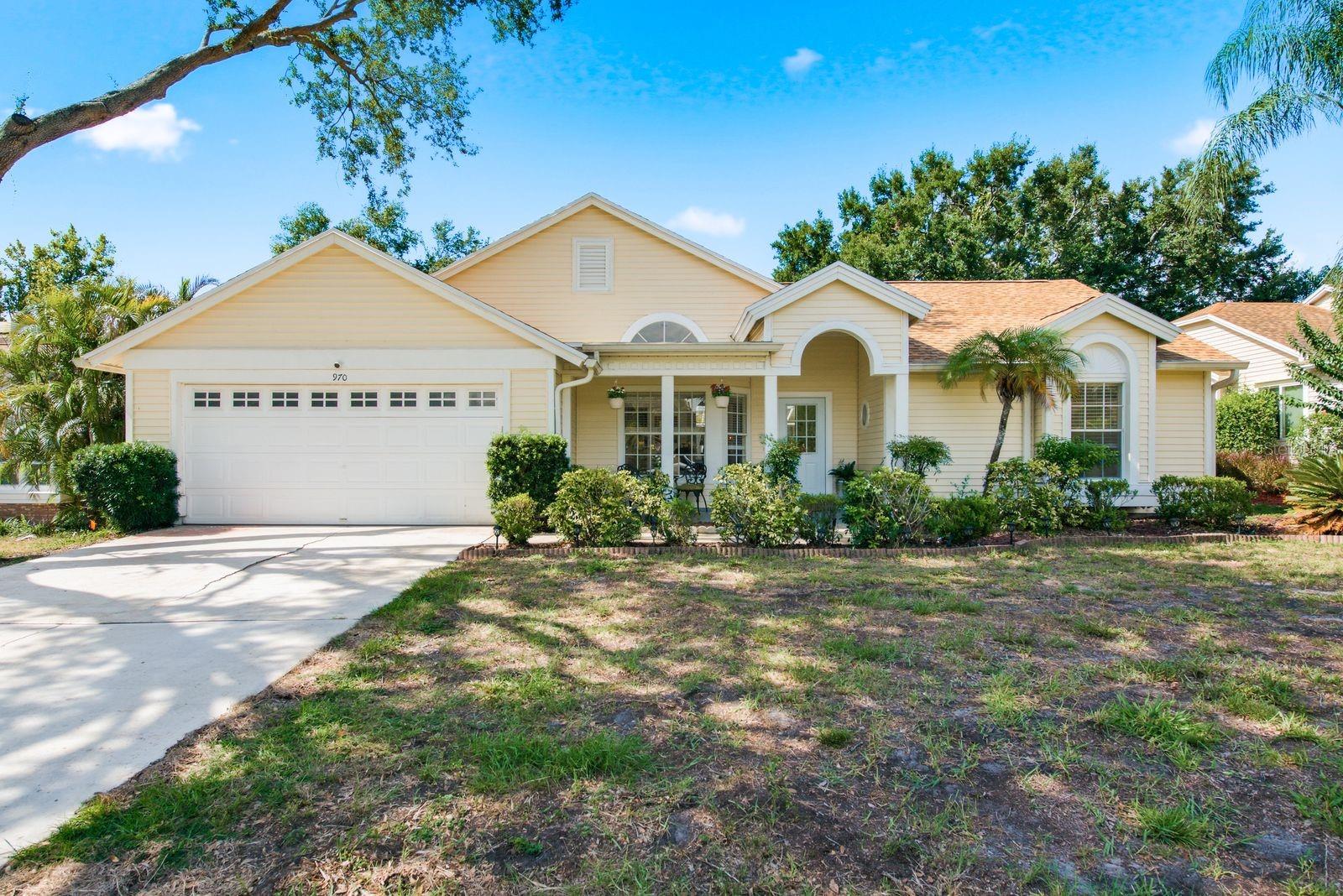 Welcome to Your Tropical Oasis in the Highly Sought-After Deep Spring Community of Palm Harbor! This spacious 4-bedroom, 2-bath, 2-car garage pool home offers an exceptional open split-bedroom floor plan, abundant natural light, and numerous recent upgrades. Enjoy peace of mind with a brand-new roof and flat roof (2026), A/C system with new ductwork (2024), freshly painted interior (2025), updated lighting and ceiling fans, new entry and rear doors, and new kitchen appliances including the dishwasher, microwave, and range. Even better, the solar system will be paid off at closing, providing energy efficiency and long-term savings. As you enter, you'll immediately appreciate the living area featuring soaring ceilings and sliding glass doors that open to the screened pool area. The formal dining room provides an elegant space for entertaining, while the private primary suite is thoughtfully positioned on one side of the home for maximum privacy. The spacious primary retreat features a large walk-in closet and an ensuite bath complete with dual vanities, a garden tub, separate walk-in shower, and private water closet. At the heart of the home, the generously sized kitchen offers a convenient eat-in dinette and opens seamlessly to the inviting family room with a cozy fireplace and additional sliders leading to the pool area. Three additional bedrooms are generously sized and share a well-appointed guest bathroom. A dedicated pool-access door right next to the guest bath adds convenience for outdoor living and helps keep wet feet out of the main living spaces. Step outside to your private backyard paradise. The screen-enclosed pool enjoys desirable southern exposure, providing sunshine throughout the day and creating the perfect setting for relaxing, entertaining, and enjoying Florida living year-round. Residents of Deep Spring enjoy access to a community park, playground, scenic ponds, and beautiful tree-lined streets. Conveniently located near shopping, dining, top-rated schools, airports, and the area's award-winning Gulf beaches, this home truly offers the best of Palm Harbor living. Don't miss this incredible opportunity—schedule your private showing today!
