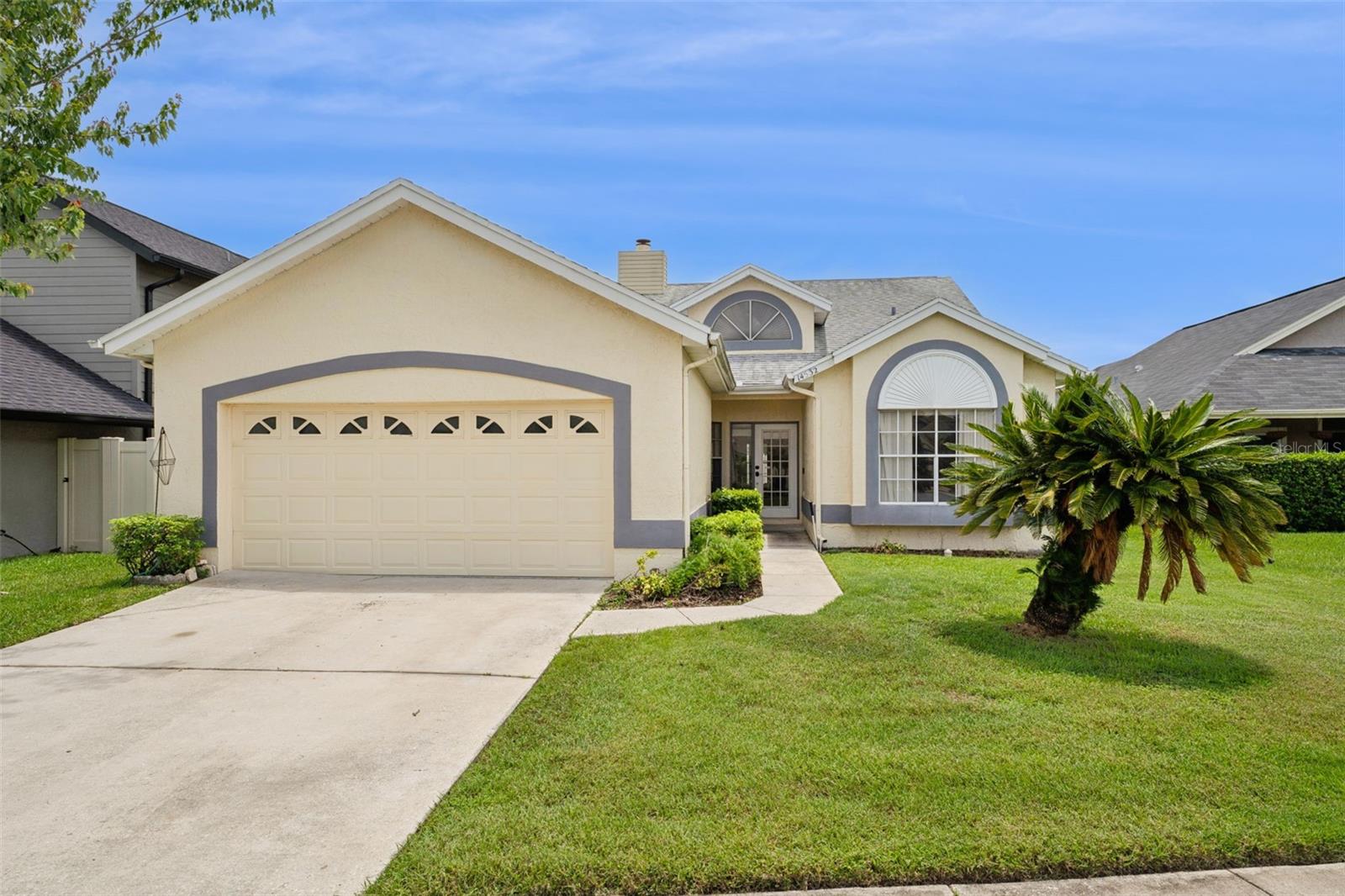 Short Sale. Being sold AS-IS Here's your chance to own an adorable home in one of Orlando's most sought-after communities, Hunter's Creek, at an incredible value!!   Located on a cul-de-sac and filled with natural light, this home features vaulted ceilings, architectural details, tiled floors throughout and an open layout waiting for your personal touch.
The kitchen offers updated grey cabinetry, bar seating, and overlooks a double-sided fireplace shared with the living room, creating a warm and inviting space. The huge primary suite includes dual vanities, a large tiled walk-in shower, and a walk-in closet.
Step outside to a covered, screened lanai that's perfect for relaxing with your morning coffee or entertaining friends, plus a fully fenced backyard with plenty of room for pets or play.  Roof 2018, A/C 2016. 
If you've been waiting for an opportunity to build equity in an exceptional neighborhood close to top-rated schools, parks, shopping, dining, and major highways, this is one you won't want to miss!