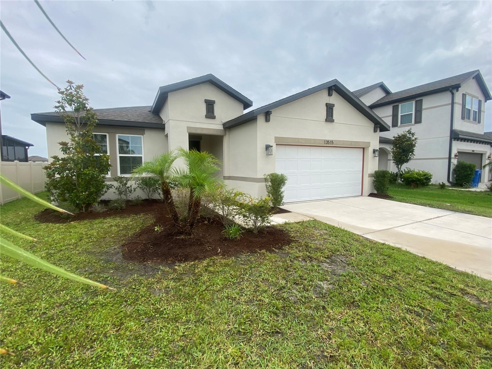 Home Sweet Home! This is beautiful 4-bedroom, 2-bath residence built in 2022 with 1,832 sq ft of spacious living space on a 0.15-acre lot (55x120) in Hillsborough has a spacious open floorplan prefect for you and your family to grow and feel like you have the space to do so. With granite countertops a spacious center island, solid wood cabinets, modern stainless-steel appliances, charming crown molding-style cabinetry details, and elegant crystal light fixtures. It's ready for your next dinner party or just downtime with the whole family. The kitchen flows into the dining room and living areas with all flooring throughout the main living areas and bedrooms have tile including the bedrooms and laundry room. The owner's suite has a spa like bathroom with a luxurious tub, his and hers dual vanities, and a large walk-in shower. Each bedrooms offers generous closet space. A 2-car garage with an expansive backyard and tranquil lake views so you can sit back and enjoy the Florida Sunsets. Tenant application fee is $80 per applicant 18 and older. Tenant processing fee ($125) due at move in addition to any rent and or security deposit. Make an appointment today to see this Move in Ready rental. This home is professionally managed and maintained. All occupants over 18 must apply. Call Property Manager Cyndi Massey for additional information or showing.