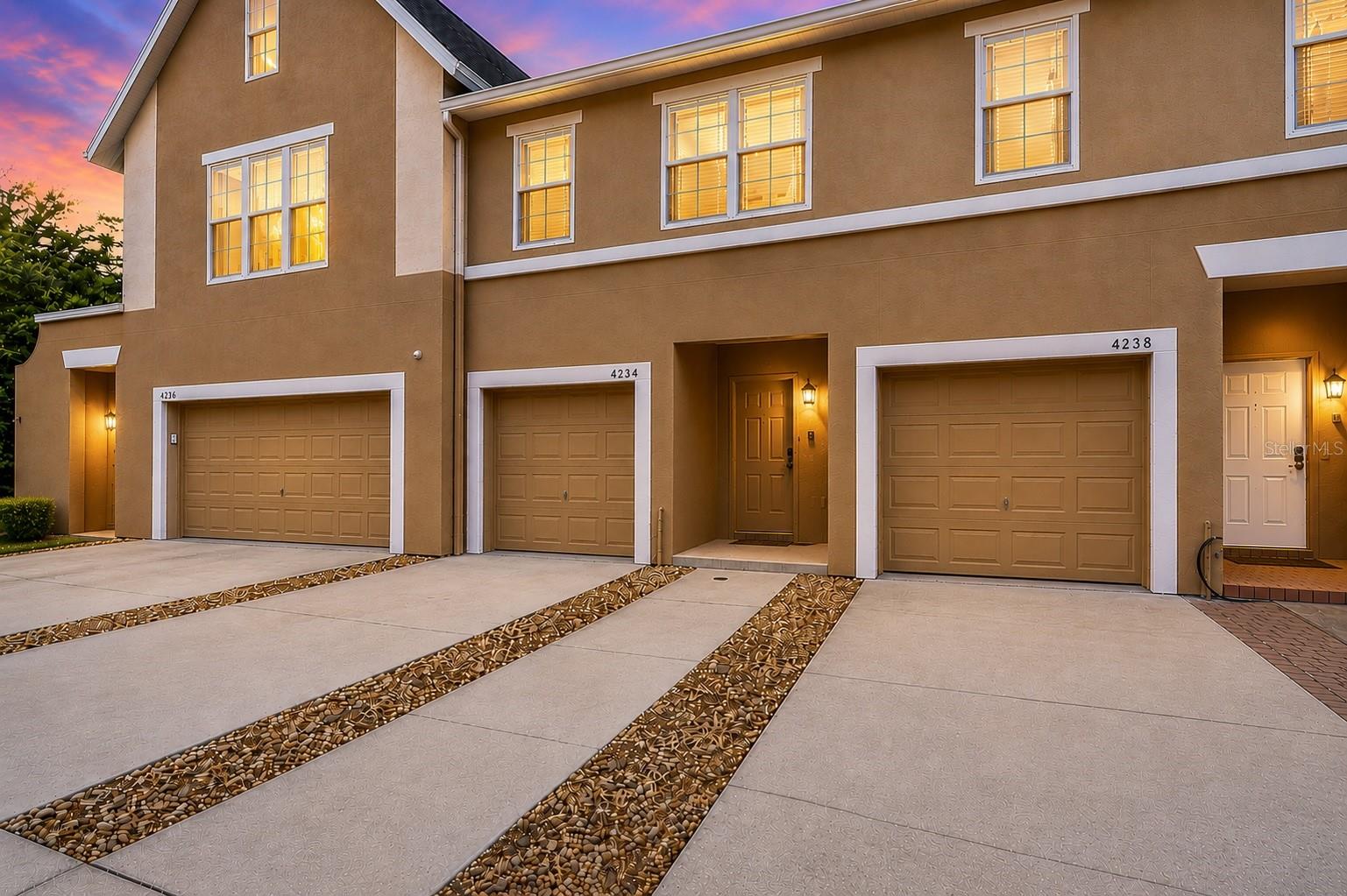 Virtually Staged. Welcome home to this bright and inviting 2-bedroom, 2.5-bath townhome located in the gated Las Palmas Townhomes community. Featuring modern finishes, a spacious layout, and a private outdoor living space, this move-in-ready home offers comfortable, low-maintenance living in a convenient St. Petersburg location.

Upon entering, you'll find a thoughtfully designed floor plan with a convenient half bath, a dedicated dining area, and a spacious living room filled with natural light. The kitchen features quartz countertops, modern cabinetry, and a functional layout that opens to the main living spaces, making it ideal for both everyday living and entertaining.

Step outside to your private patio and backyard retreat, recently refreshed with new landscaping. The backyard and fencing have been pressure washed, creating an inviting outdoor space perfect for relaxing, grilling, or enjoying Florida's beautiful weather year-round.

Upstairs, the spacious primary suite offers plenty of natural light and features an updated en-suite bathroom with tile finishes, a tub/shower combination, updated vanity, and fixtures. A generously sized secondary bedroom and an additional full bathroom provide flexibility for guests, family members, or a home office.

Additional highlights include fresh interior paint, updated flooring, modern light fixtures, updated plumbing fixtures, and a newer HVAC system. The home has been well maintained and is truly move-in ready.

Residents of Las Palmas Townhomes enjoy the gated community along with HOA-covered water, sewer, trash, exterior grounds maintenance, and community management.

Conveniently located near shopping, dining, parks, and the vibrant downtown St. Petersburg area, this home offers the perfect blend of comfort, convenience, and value.