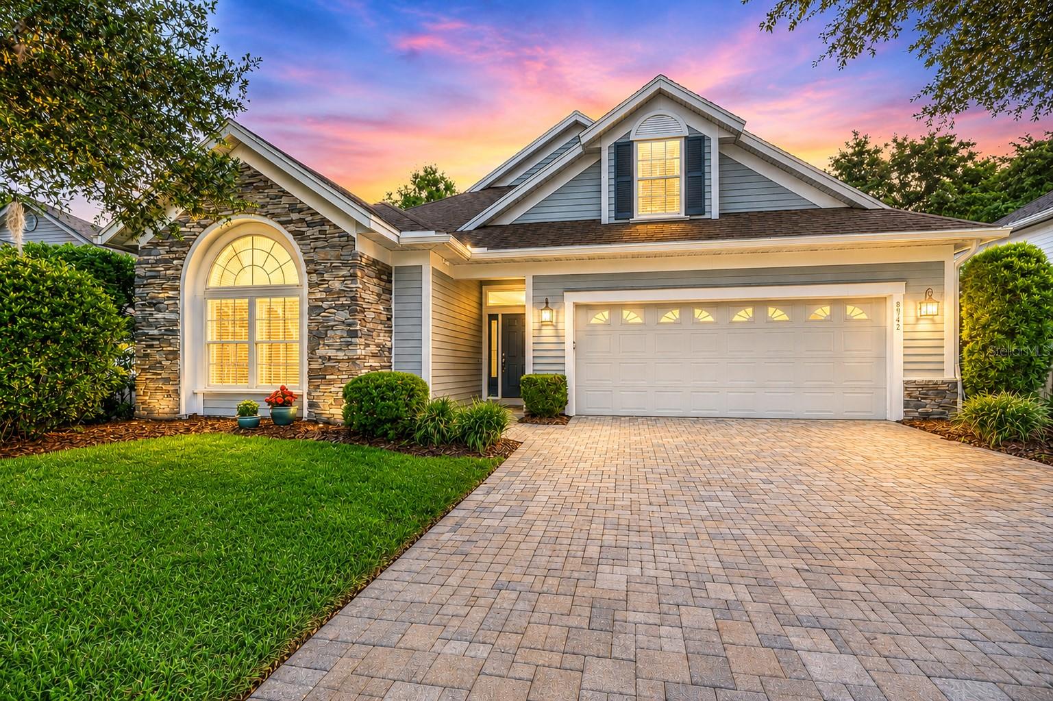 Former Jeffrey Wilde Custom Parade Home carefully maintained by its original owner, this Haile Plantation Market Square residence reflects thoughtful construction and long-term stewardship that experienced buyers will recognize immediately. Located on a quiet street just behind Haile Market Square, the home combines efficient design, high-quality materials, and convenience in southwest Gainesville’s most established community.

The floor plan offers 4 bedrooms, 3 bathrooms, an open and bright Florida Room, plus a separate bonus room with full bath over the garage—ideal for guests, hobbies, or multigenerational living. A soaring skylight above the oversized kitchen island fills the central living spaces with natural light, while crown molding and a tray ceiling elevate the primary suite. The owner's walk-in closet includes a custom closet system.

Additional features include Icynene spray foam insulation, a high-efficiency 3-zone HVAC system, tankless water heater, oversized 2-car garage, and front lawn maintenance. Outside, the paver patio, arbor-covered outdoor kitchen area and gathering spaces create an environment designed for daily unwinding and special-occasion entertaining.

A private coded gate at the rear of the neighborhood provides direct access to Publix, restaurants, and shops in Market Square, including Petite Upper Crust Bakery. The shops, restaurants, and Saturday farmers market at Haile Village Center are also nearby.

Approximately 2.8 miles to HCA Florida North Florida Hospital, 4.7 miles to UF College of Veterinary Medicine, and 5.5 miles to UF Health Shands Hospital.