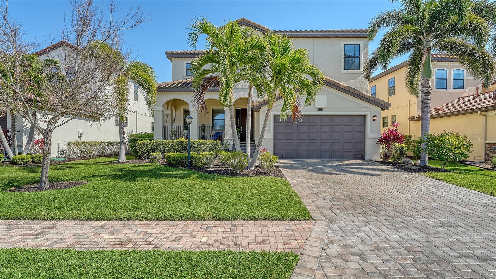 As an added incentive, the seller is providing a $50,000 credit at closing that can be used toward the construction of a custom pool.
Refined two-story residence in the exclusive gated community of Legends Bay. Built in 2016, this home offers 3,642 sq. ft. of thoughtfully designed living space, featuring 5 bedrooms, 4.5 baths, and a private office.
A grand foyer with soaring ceilings welcomes you into elegant, light-filled interiors with a seamless flow between formal and casual living spaces. An expansive loft provides flexible use, while the primary suite offers a private and serene retreat.
Residents of Legends Bay enjoy a lakeside pool, observation pier with Sarasota Bay views, and beautifully maintained surroundings.
Ideally located just minutes from IMG Academy, Gulf beaches, SRQ Airport, and downtown Sarasota, with convenient access to IMG Golf Club.
A rare offering where design, location, and lifestyle come together.