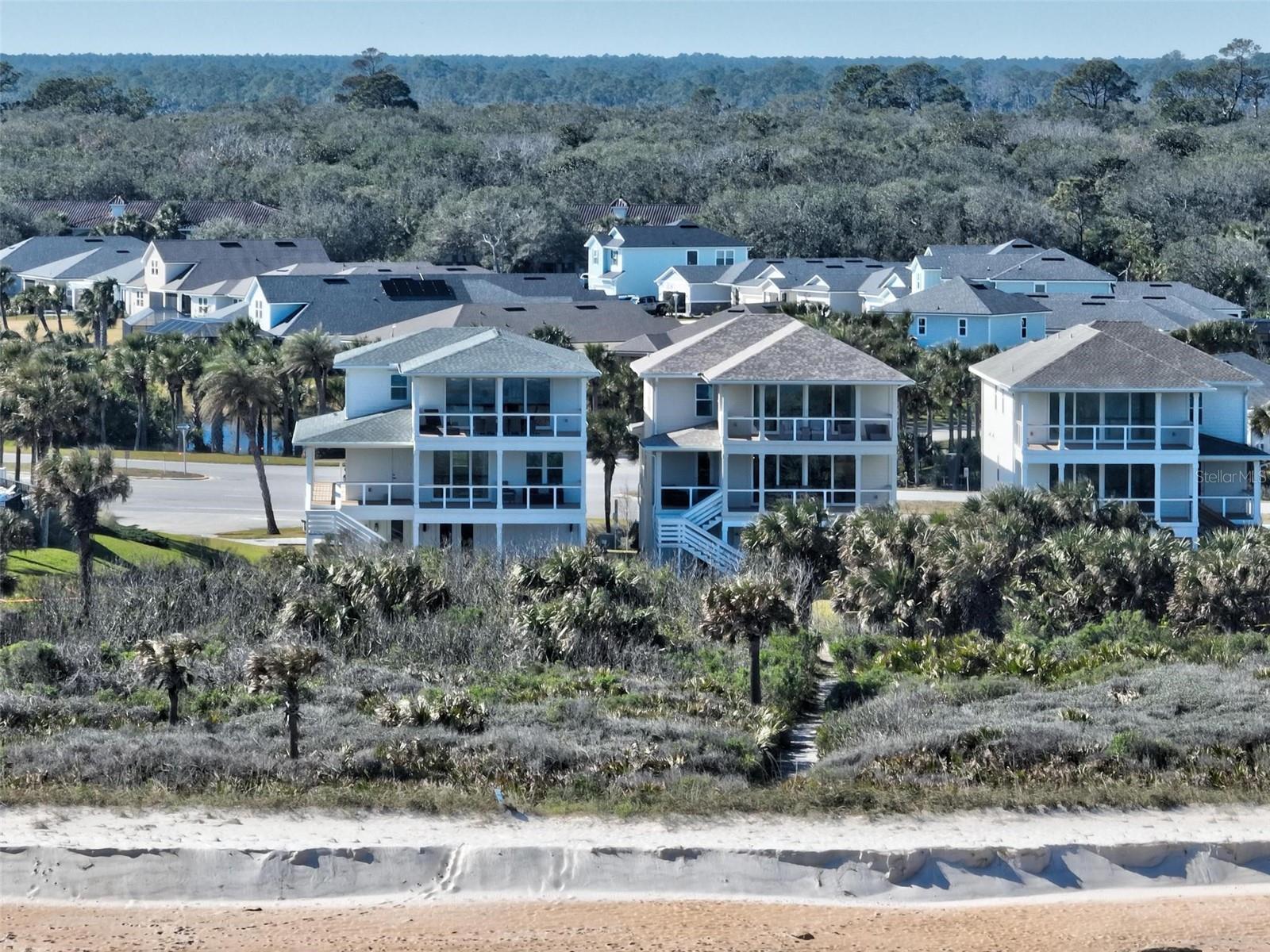 DIRECT OCEAN FRONT   Private walk over to beach from yard.  Access to two HOA amenities 
Stunning 6-bed 5.5-bath with breathtaking panoramic ocean views. Located in the sought-after Matanzas Shores community. Ride the elevator 2nd or 3rd floor and enjoy the panoramic view of ocean!  Over 1,500 sq ft of covered porches, perfect for relaxing with a morning coffee or entertaining with ocean breezes.  

As a resident of Matanzas Shores, you'll enjoy an array of upscale community amenities, including:

A large oceanfront pool and clubhouse

a second pool and two additional clubhouses

a covered fishing dock with cleaning stations on the Intracoastal 

Small boat/kayak storage

Scenic walking trails through beautifully landscaped grounds

This extraordinary property offers a rare opportunity to own a piece of paradise in one of the most desirable communities on Florida’s coastline—ideal as a luxurious primary residence, vacation home that pays for itself or high-end rental investment .