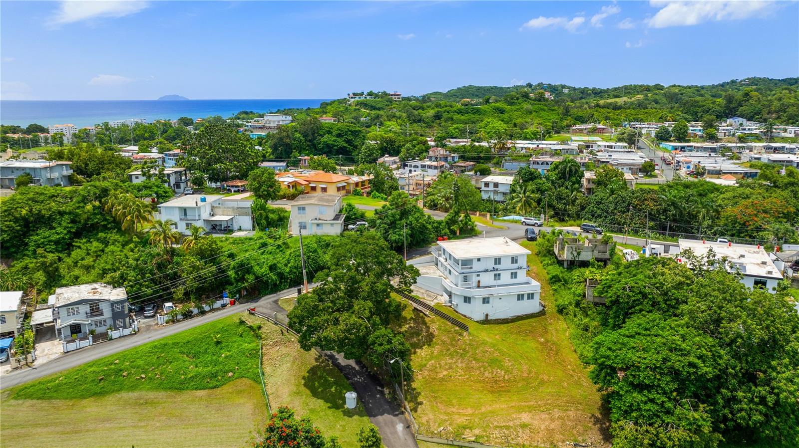 Prime Turnkey Multifamily Investment Opportunity in Rincon, Puerto Rico
Discover a rare investment opportunity in Rincon, Puerto Rico, the "Surf Capital of the Caribbean," with this turnkey multifamily property located in the heart of Rincon Town Center. This fully operational property offers a solid return on investment with both short-term and long-term rental potential. Situated walking distance to Rincon’s lively town square, it offers tenants a perfect balance of residential tranquility and easy access to numerous restaurants, bars, and local shops. The stunning Rincon beaches are also just a short drive away, ensuring the property is poised to attract year-round rental demand.
This property spans three levels and features five separate apartments, each with its own private kitchen, living area, and bathroom, all equipped with air conditioning for optimal comfort. The first level includes a 1-bedroom, 1-bath apartment and a 2-bedroom, 1-bath apartment with a balcony, offering a cozy and welcoming living space. The second level houses two 2-bedroom, 1-bath apartments, both featuring spacious walkout terraces. The ground level includes a 3-bedroom, 1-bath apartment with ample living space. Each unit is designed for tenant convenience, with multiple parking spaces and a laundry facility located on the lower level.
The property sits on a 1,417 m² lot, providing plenty of room for future development or additional amenities, which could increase both rental income and overall property value. The mixed zoning offers flexibility for potential expansion, adding even more value to this already promising investment. Gross Building Area of 3,908 SF. and a Gross Living Area of 3,153 SF, this property is an excellent opportunity for both experienced and new investors.
Rincon’s growing popularity as a tourist and residential destination makes this property an excellent choice for anyone seeking to capitalize on the area's continued appreciation and demand. Whether you are looking to enter the lucrative short-term rental market or secure long-term rental income, this multifamily property offers flexibility and potential for significant returns. With easy access to the town center and nearby beaches, it offers the perfect mix of convenience, comfort, and prime location.
This is your chance to invest in a thriving market at an attractive price. Don’t miss out on this exceptional multifamily opportunity in Rincon. Contact us today for more information and to schedule a tour.