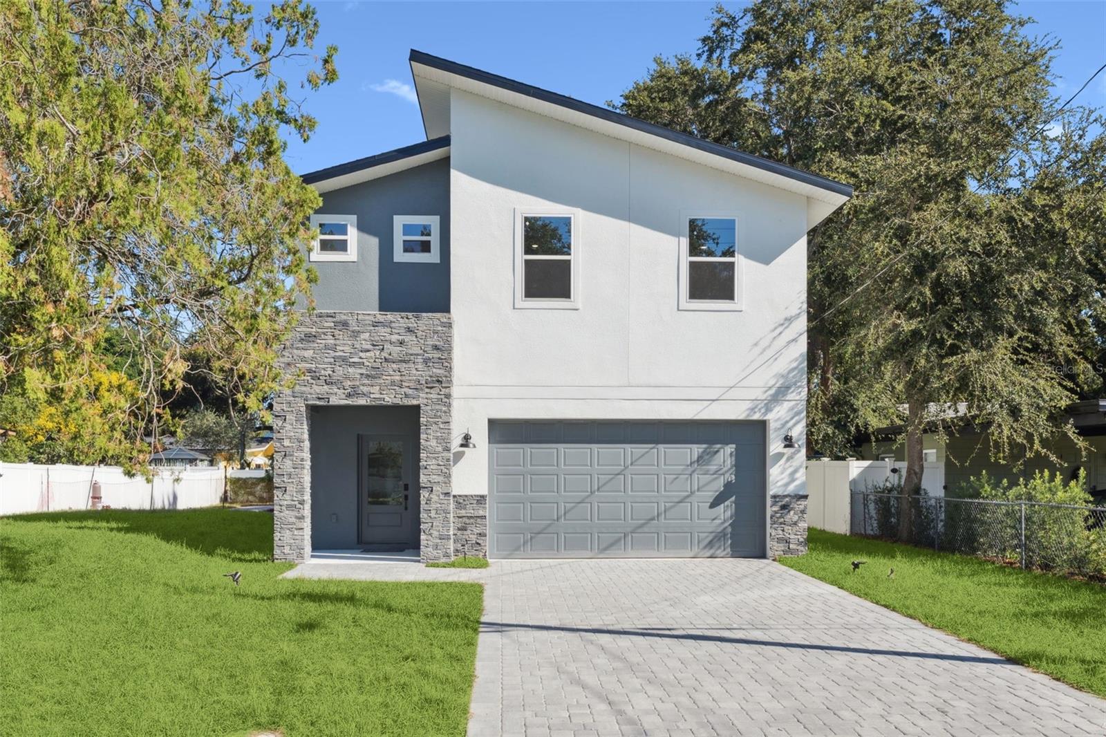 Modern Luxury in Belle Isle! This stunning 4-bedroom, 2.5-bath home combines style and convenience in one perfect package. Designed with an open-concept layout, the main floor features high ceilings, elegant finishes, a chef’s kitchen with GE Profile appliances and a half bathroom for added convenience. Upstairs, you’ll find all 4 spacious bedrooms and 2 bathrooms, along with a convenient laundry room.
Step outside to your FULLY FENCED (not shown in pictures) private backyard retreat complete with a sparkling inground pool—perfect for entertaining or relaxing. Located just 6 miles from Downtown Orlando and 4 miles from Orlando International Airport, you’re surrounded by restaurants, shops, and public boat ramps for endless lifestyle options.
Don’t miss the opportunity to own a modern home with luxury details in the highly sought-after Belle Isle area!