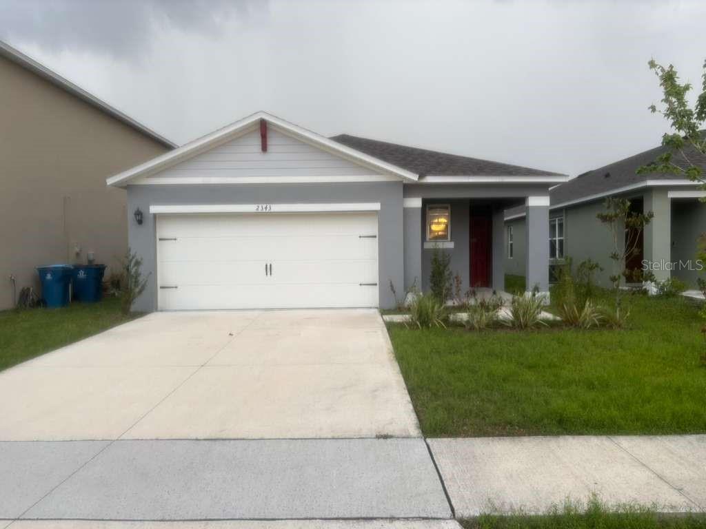 Welcome to this stunning, move-in-ready residence located in the sought-after community of Eagle Hammock in Eagle Lake. Built in 2023, this meticulously maintained "Jemison" model by D.R. Horton offers the perfect blend of modern design and functional living space.
Featuring an inviting open-concept floor plan, this home boasts 3 spacious bedrooms and 2 full bathrooms across over 1,600 square feet of interior living area. The heart of the home is the contemporary kitchen, which shines with solid surface countertops, a large island perfect for breakfast seating, and a full suite of stainless steel appliances. The kitchen flows seamlessly into the expansive great room, creating an ideal environment for entertaining and everyday living.
The primary suite serves as a private retreat, featuring a generous walk-in closet and an en-suite bathroom with dual vanities and a modern walk-in shower. Two additional bedrooms share a well-appointed second bathroom, providing ample space for family or a home office.
Energy efficiency is a hallmark of this 2023 construction, including dual-pane windows and modern insulation. Outside, the property features a manicured lawn and an attached two-car garage.
Residents of Eagle Hammock enjoy premium community amenities, including a resort-style swimming pool, a playground, and scenic walking trails. Conveniently located near US-17, this home provides easy access to Lake McLeod, local shopping, dining, and major Central Florida attractions.
Experience the benefit of a newer construction home without the wait for a builder’s timeline. Schedule your private showing today and discover why 2343 Aquiline Nest Street is the perfect place to call home.