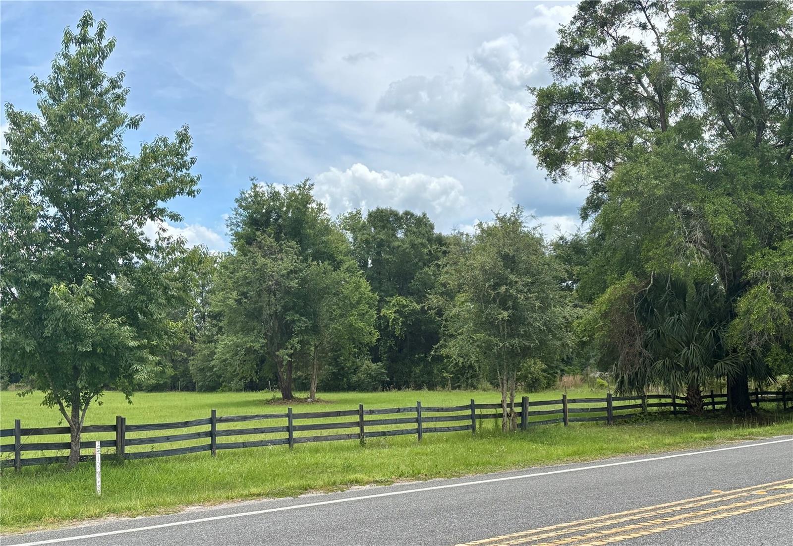 Build your Dream home on this Amazing 1.72 Acre Parcel with paved road frontage surrounded by Homes and Farmland in Beautiful High Springs.
