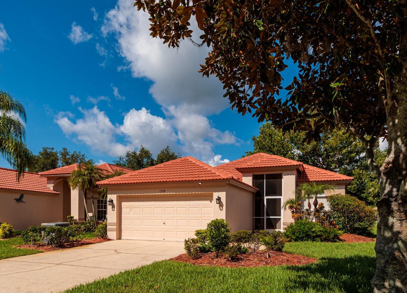 Beautiful sunsets await you. Welcome to this beautifully maintained 3-bedroom, 2-bath home offering 1,983 square feet of comfortable living space in one of the area's most desirable guard-gated golf course communities. Perfectly situated with tranquil pond views, this home provides the ideal blend of privacy, scenic beauty, and resort-style living.

The spacious floor plan features generous living and entertaining areas, a two-car garage, and a layout designed for both everyday comfort and hosting family and friends. Relax on your lanai while enjoying peaceful water views or take advantage of the community's golf cart-friendly streets for easy access to neighborhood amenities and the golf course. 
Located within a highly sought-after community featuring A-rated schools, this home offers exceptional convenience for families while providing the security and peace of mind of a guarded, gated entrance. Whether you're looking for an active lifestyle or a serene place to call home, this property delivers the best of both.

Don't miss this opportunity to own a beautiful home in a premier golf course community where outstanding schools, scenic surroundings, and exceptional amenities come together to create the perfect Florida lifestyle.  Come make it all yours. Call for a private showing today.