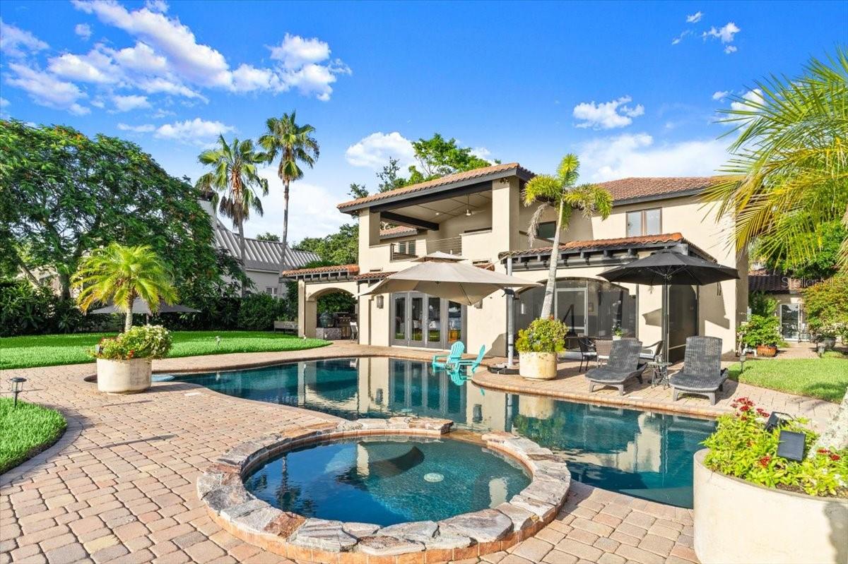 Huge Price Reduction – Now Offered at $4,525,000 (Previously $5,100,000)

Welcome to 206 Canova Drive, a Tuscan-Inspired Waterfront Estate unlike anything else in New Smyrna Beach. Set on 100’ of direct Intracoastal Waterway with deep water access, a 55’ floating dock accommodating vessels up to 80’, and a boat lift, this home is the ultimate blend of luxury, privacy, and lifestyle.

Dock permitting on the island can be difficult.  The dock cannot impede the ICW, so checking on this prior to purchasing property is a must!   This is one of the most compelling waterfront opportunities in New Smyrna Beach. Just one mile away, a vacant lot with 100' of direct Intracoastal Waterway on the North Causeway Peninsula recently sold for $4,000,000 with no home, no pool, no dock, and no easy walk to Flagler Ave. 
At 206 Canova Drive, you not only secure 100' of prime frontage, but also a 55’ floating dock with lift (permits for new floating docks of this size are no longer obtainable), an in-ground pool, and over 4,000 square feet of existing living space. While many buyers may choose to create their own custom estate here, this property allows you to enjoy the waterfront lifestyle immediately while planning your future.  

Privately tucked away on Canova Drive, widely regarded as the best street in the best location, one block walking distance from Flagler Avenue with access to both bridges for effortless on and off the island, this property offers both legacy and lifestyle. The street itself is steeped in history, private and coveted, known only to locals for its rare charm.

The residence is an entertainer’s dream and boater’s paradise, with five bedrooms, four baths, a detached guest house with full kitchen, and multiple indoor-outdoor living spaces. Host over 150 guests with ease across the resort-style pool and spa, PebbleTec finish, tanning ledge, fire pit, gourmet outdoor kitchen, and screened patios with roll-down screens. Inside, soaring ceilings and panoramic river views anchor the chef’s kitchen with gas range, granite counters, and premium appliances. The spacious primary suite offers a redone spa-style bath and private balcony overlooking the ICW, framed by fire lamps. Additional features include a private office with wine storage, a bonus room with sauna, and a home gym.

Located within walking distance of Flagler Avenue’s dining, shopping, and nightlife, yet nestled in complete privacy, 206 Canova Drive is more than a home. It is a generational property: a rare combination of location, water frontage, and amenities that cannot be replicated. LOCATION, LOCATION, LOCATION!

WHEN LOCAL KNOWLEDGE IS REQUIRED, INSIST ON A LOCAL BROKER OF NSB.