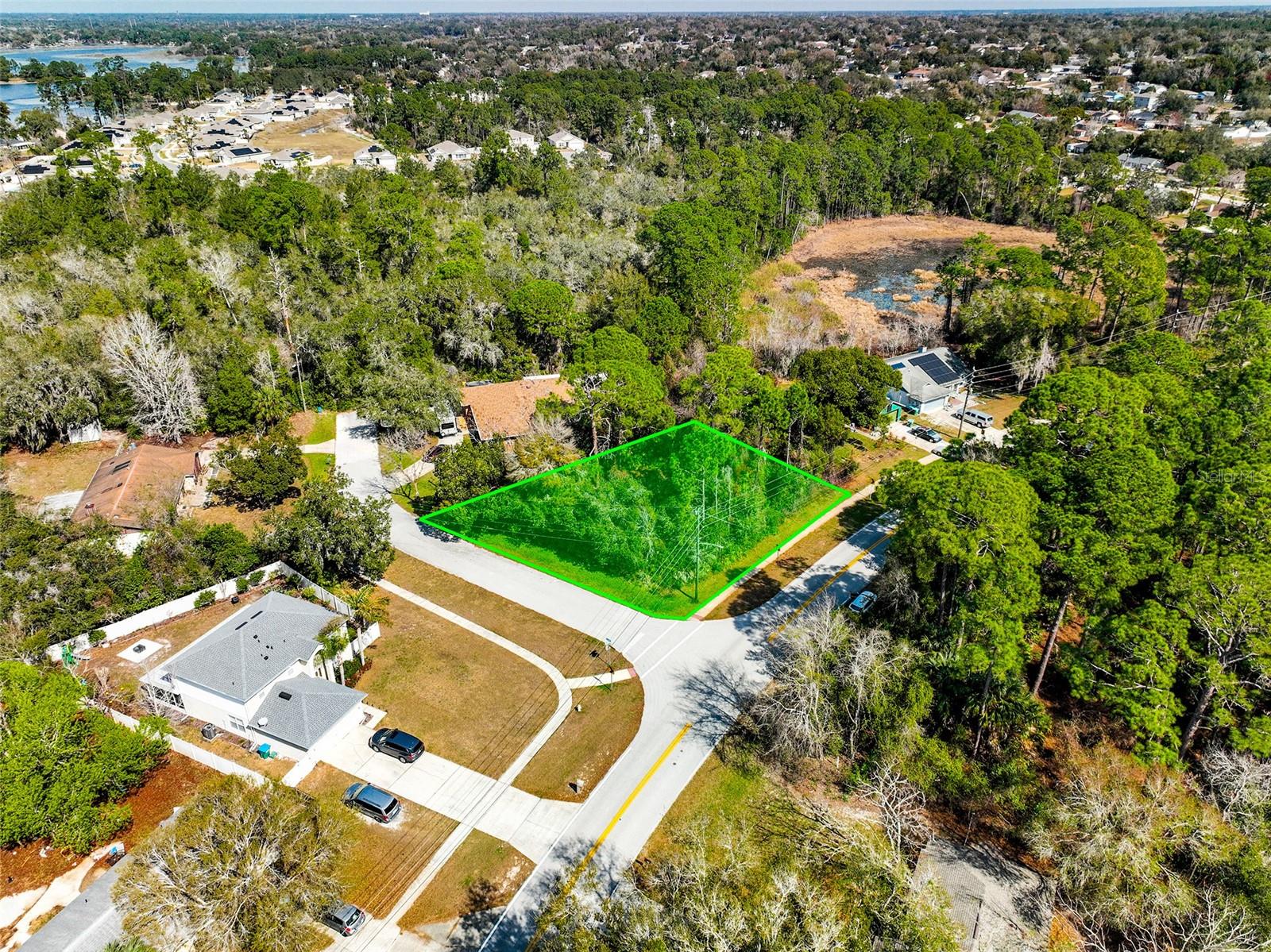 Exceptional opportunity to build on a spacious .30 acre corner lot located at 632 Anderson Drive in the desirable Deltona Lakes community. Offering approximately 13,200 square feet, this oversized homesite provides flexibility for a custom residence, pool, and outdoor living space while still allowing for privacy and curb appeal on a prominent corner position. The property is situated in an X flood zone, offering peace of mind with no required flood insurance, and has public water and electricity available, making it ready for your vision.

Deltona Lakes is known for its established neighborhoods and convenient access to everyday essentials and major commuting routes. The property is located near Interstate 4, State Road 415, and Howland Boulevard, providing easy connectivity to Orlando, Daytona Beach, and surrounding Central Florida destinations. Nearby cities include Deltona, DeLand, Lake Mary, and Sanford, offering a variety of shopping, dining, and entertainment options.

Convenient access to air travel includes Orlando Sanford International Airport and Daytona Beach International Airport, both within a reasonable drive. Daily conveniences are just minutes away with grocery options such as Publix Super Market at Saxon Crossings, Walmart Supercenter, and Aldi.

Zoned for highly regarded Volusia County schools including Forest Lake Elementary School, Deltona Middle School, and Deltona High School, this location offers strong educational options. Outdoor enthusiasts and pet lovers will appreciate nearby parks such as Dewey O. Boster Sports Complex, which features a popular dog park and recreational amenities, as well as access to Lake Monroe and the St. Johns River for boating and nature activities.

Public transportation options are available through Votran, providing bus service throughout the area and connections to neighboring cities.

This property presents an ideal blend of location, size, and accessibility, making it an excellent opportunity for builders, investors, or end users looking to create a custom home in a growing Central Florida community.