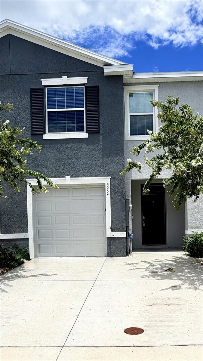 THIS TOWNHOME IS PRICED FOR IMMEDIATE SALE! READY TO MOVE IN! This Beaumont Townhomes community is in Wildwood and minutes away from The Villages Lake Sumter and Brownwood Paddock Squares. The foyer opens up to the spacious first floor with ceramic tile throughout and has a powder room/half bathroom as soon as you walk in! The open kitchen features smooth granite counters and stainless-steel appliances, as well as a walk-around island. Also included is a generous sized walk-in pantry. There is newly installed carpeted stairs and bedrooms on the second floor, you'll find The main bedroom to your immediate right that has two walk-in closets and a private bathroom with twin sinks and a modern step-in shower. Loads of closet space in all the bedrooms!! There's even an extra closet for linens in the hall. The second bathroom has a tub and shower combo for whichever you'd prefer. The laundry room includes upgraded built in solid wood shelving. With a wall for privacy and no back neighbors, its very nice to sit on the lanai and enjoy the Florida sunshine! Conveniently located right across from the guest parking spots and just a quick 2 minute walk to the community pool just around the corner - you've got everything you need here to enjoy company and relaxation. Lawncare is included in the HOA so you don't even have to worry about that! This is a smart home, with a video doorbell and an app that can lock the front door, open the garage door, change the home temperature and turn on lights. Please call today to schedule your own private tour of this beautiful townhome!
