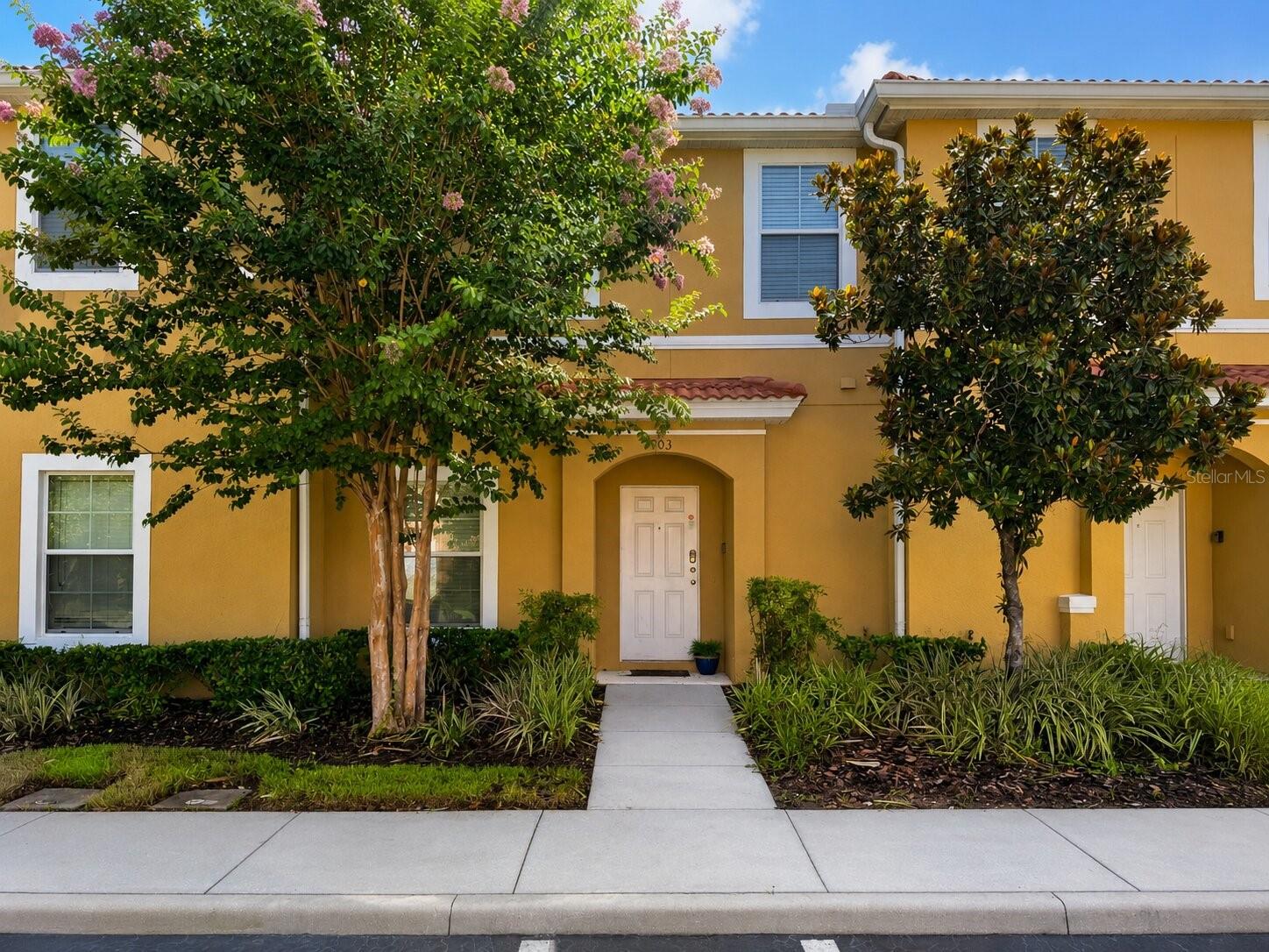 Welcome to this beautifully maintained 2-bedroom, 2.5-bath townhome offering 1,161 square feet of fully furnished living space in Encantada Resort. Whether you're looking for a primary residence vacation home or investment property this home is move-in ready and ready to enjoy. The open-concept first floor features tile flooring, a spacious living and dining area and a well-appointed kitchen with granite countertops and ample cabinet space. Upstairs, you'll find laminate flooring throughout the stairs and second level, with no carpet anywhere in the home. Step outside to your private screened lanai, where you can unwind in your own hot tub. Encantada Resort offers an excellent selection of amenities, including two heated pools, two hot tubs, a clubhouse, fitness center, playground, walking trails, scenic lakes, a fishing dock, and a poolside restaurant and bar. Conveniently located just minutes from Walt Disney World, shopping, dining, golf, and major highways, this home combines comfort, convenience and the Florida lifestyle in one exceptional package.

Schedule your private showing today!