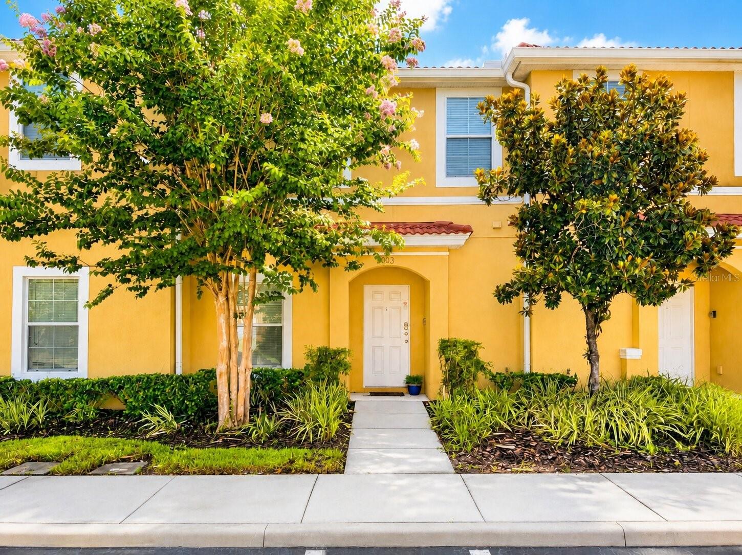 Welcome to this beautifully maintained 2-bedroom, 2.5-bath townhome offering 1,161 square feet of fully furnished living space in Encantada Resort. Whether you're looking for a primary residence, vacation home or investment property, this home is move-in ready and ready to enjoy. Enjoy the security and convenience of a 24-hour guarded gated community, along with an outstanding selection of resort-style amenities, including two heated pools, two hot tubs, a clubhouse, fitness center, playground, walking trails, scenic lake and a poolside restaurant and bar. The open-concept first floor features tile flooring throughout, a spacious living and dining area and a well-appointed kitchen with granite countertops and ample cabinet space. Upstairs, you'll find laminate flooring throughout the stairs and second level, with no carpet anywhere in the home. Step outside to your private screened patio area, where you can unwind in your own hot tub.Additional highlights include a 2024 air conditioning system, providing value and peace of mind. Conveniently located just minutes from Walt Disney World, shopping, dining, golf, and major highways, this home combines comfort, convenience, and the Florida lifestyle in one exceptional package.

Schedule your private showing today!