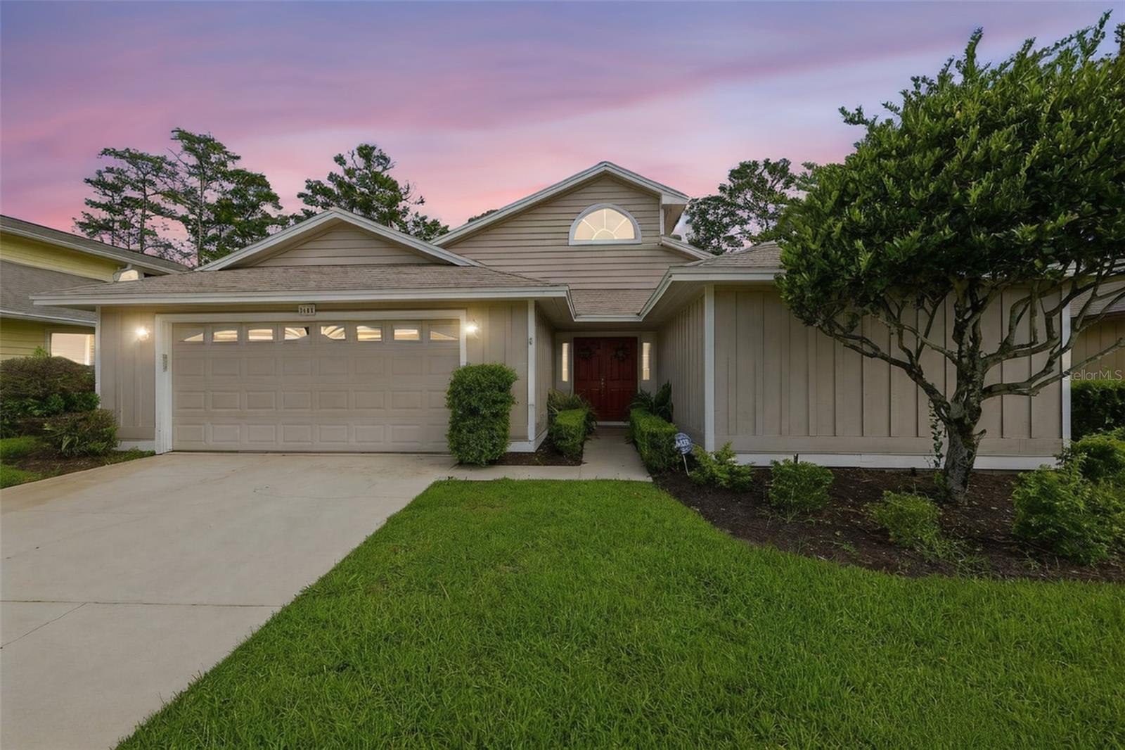 *Roof- 2024; HVAC- 2018; Water Heater- 2018; New Kitchen Appliances* Nestled within one of Ormond Beach's premier gated golf communities, this beautifully maintained residence offers an exceptional blend of privacy, comfort, and picturesque golf course living. Perfectly positioned along the tee box of the 4th hole, the home enjoys tranquil fairway views and an inviting setting that captures the essence of Florida's relaxed lifestyle. Thoughtfully designed with soaring vaulted ceilings and an abundance of natural light, the spacious floor plan welcomes you with an airy, open feel from the moment you enter. Multiple living and gathering spaces provide flexibility for both everyday living and entertaining, including an elegant front sitting room, a spacious family room, and a dedicated office or flex space that easily adapts to your needs. At the heart of the home, the open-concept kitchen offers generous cabinetry, expansive countertop space, a breakfast bar, and seamless sightlines into the main living area, making it easy to stay connected whether preparing meals or hosting family and friends. Designed to embrace Florida's indoor-outdoor lifestyle, the home's unique courtyard-inspired layout creates a peaceful and private atmosphere. The expansive screened lanai with brick paver flooring is ideal for outdoor dining and entertaining, while the covered patio and bright enclosed sunroom, surrounded by walls of windows, provide the perfect place to enjoy morning coffee, unwind with a good book, or simply take in the beautiful surroundings throughout the year. The split-bedroom floor plan offers added privacy, with a spacious primary suite thoughtfully separated from the guest bedrooms. Additional features include an indoor laundry room, an attached two-car garage, mature landscaping, and the added value and peace of mind of a roof replaced just one year ago. Beyond the home, residents enjoy an outstanding collection of resort-style amenities, including two championship golf courses, a state-of-the-art practice facility, pickleball and tennis courts, a private country club, a community swimming pool, and beautifully maintained recreational spaces that foster an active and social lifestyle. Ideally located just minutes from the renowned Ormond Scenic Loop, pristine Atlantic beaches, shopping, dining, and convenient highway access, this exceptional home offers the perfect balance of peaceful golf course living and everyday convenience. Whether you're searching for a full-time residence or a seasonal Florida retreat, this move-in-ready home delivers timeless appeal, an unbeatable location, and the lifestyle you've been waiting for.