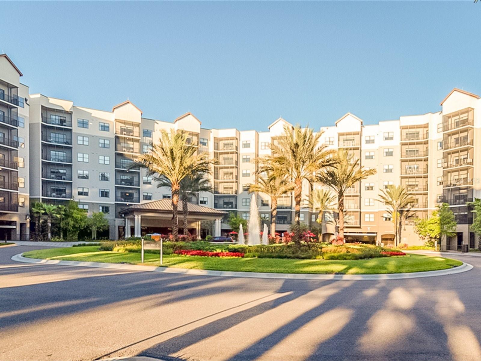 This stunning 7th-floor condo at The Grove Resort & Spa offers breathtaking water views, overlooking the pond, water park and conservation serene area. This fully furnished, all-inclusive condo-hotel provides a truly hands-off investment opportunity with onsite property management and a full-service rental program. Located in Building 3, this luxury 2-bedroom, 2-bath unit is perfectly situated just steps from restaurants, pool and resort amenities. Features an open floor plan with modern furnishings and all necessary housewares. The spacious primary suite includes a king bed, while both guest bedrooms have queen beds for comfortable guest accommodations. The fully equipped kitchen features stainless steel appliances, including refrigerator, range, microwave, and dishwasher. A private laundry closet with washer and dryer adds convenience for guests. Owners and guests alike will enjoy relaxing on the private screened balcony overlooking the water. The Grove Resort offers exceptional amenities including multiple resort pools, Surfari Surf Park, Lake Austin with fishing dock and paddleboats, Escape Spa, fitness center, on-site restaurants, sundry shop, arcade, and youth activity center. Ideally located just minutes from Walt Disney World, Universal Studios, and Orlando’s top attractions, this property provides the perfect combination of luxury, convenience, and income potential.