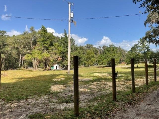 Amazing lot, 2.3 acres 8 minutes from Celebration pointe, I-75, Shands Hospital and UF. This a ready to build lot, with a mix of cedar and oak trees thoughtfully left in place to enhance the natural setting . The hard work has been done, buy it and build your dream home, surrounded by nature, and yet so close to all of Gainesville. Zero turn riding mower and trailer included with the purchase