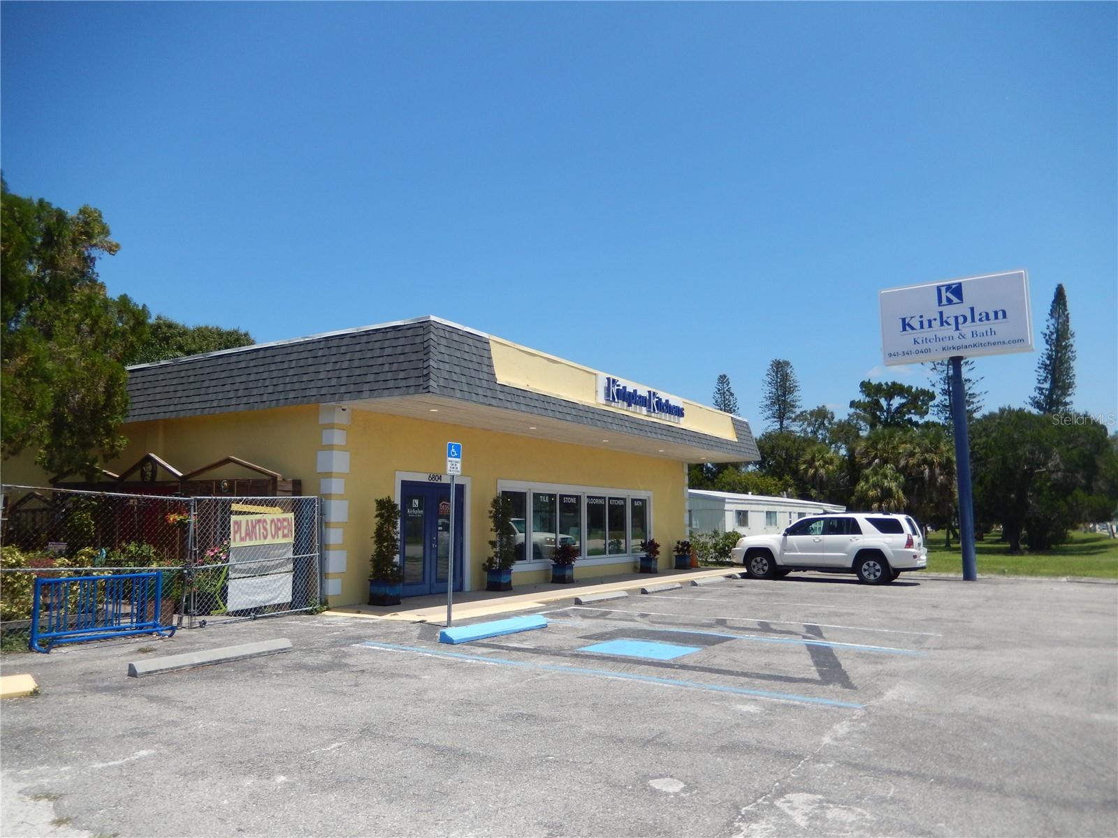 FOR SALE - Freestanding single-tenant 1,800 SF commercial building on a 0.58-acre site.  Outstanding income investment opportunity or owner-user site.  Flexible floor plan and now occupied by Kirkplan Kitchens under a long-term (5-year) lease, which expires in August 2026.  The tenant has opted not to renew their lease and may vacate early upon a sale or new lease.  Situated on the heavily traveled east-west Cortez Rd thoroughfare, which connects the mainland to the Gulf Beaches.  Traffic ~29,000 VPD.  Currently, it is built out as an upscale kitchen-and-bath showroom, with a reception area, showroom, and restroom.  Zoned: GC (General Commercial).   Improvements: Building dimensions: 50’ x 36’ (business area), plus front canopy. Year built: 1970.  Concrete block construction.  Mansard-style roof with membrane covering, installed in 2024.  Ceiling height 10'-12'.  Slab foundation.  Ceramic tile flooring.  Central AC/heat.  Public water and septic tank.  Building front signage and pole sign. Ample asphalt parking lot, with 10+ spaces. Canopy, walkway, and display windows on the front of the building.  Security system. Floor Area Ratio (FAR) 0.08 (approximate). The western portion of the parcel is occupied by a vegetable/fruit stand business in a temporary structure, with an annual lease.   Approximate 175’ frontage on Cortez Rd.