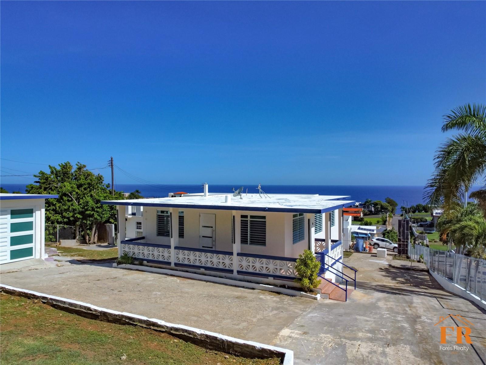 ?? PR-4484 Km 1.7 corner Georgina García St., Barrio Terranova, Quebradillas PR 00678

Single-story residence fully renovated in 2025, situated on a 1,413 square meter corner lot in Barrio Terranova, Quebradillas. One of the largest residential lots available in this corridor.

Property Includes:
?? 3 bedrooms | 2 full bathrooms (main residence)
?? Detached in-law suite with full bathroom and private entrance
?? Detached covered garage with half bath
?? Open rooftop terrace with ocean views
?? New kitchen with custom cabinets and full appliance package
?? Fully rebuilt bathrooms with modern finishes
?? New windows, doors, and garage door throughout
?? Updated electrical
?? Laundry area
?? Perimeter fencing | Paved access

Property Data:
?? Lot: 1,413.24 sqm (15,213 sq ft) 
?? AAA Water connected | LUMA Electric connected | Septic tank

Location:
?? 11 miles to Jobos Beach, Isabela
?? ~1 mile to Guajataca Beach
?? ~16 miles to Rafael Hernández Airport (BQN) — direct U.S. flights
?? ~10 min to Walmart Supercenter Isabela
? ~15 min to Royal Isabela Golf Club
?? Direct access to PR-2
