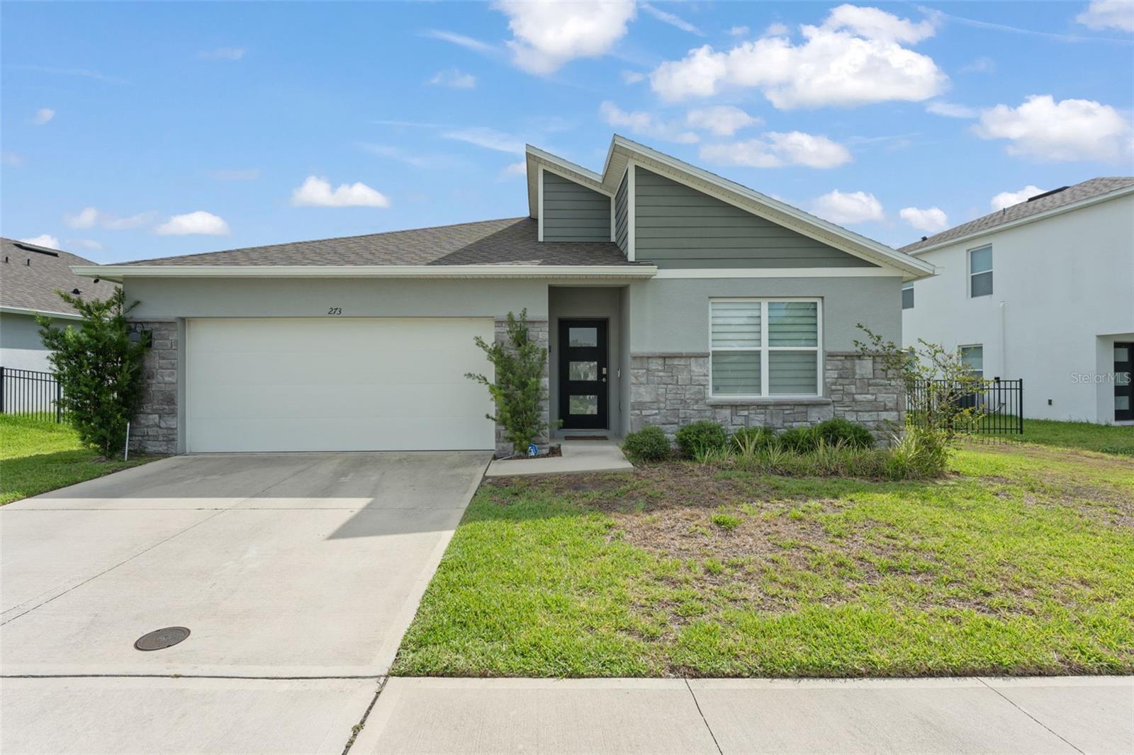 WITH THE RIGHT OFFER SELLER WILL CONTRIBUTE 5K TOWARDS BUYERS PREPAIDS AND CLOSING COSTS

Welcome to 273 Talisi Loop Street in St. Cloud, a 4-bedroom, 2-bath home offering an open floorplan, comfortable single-story living, and a backyard setting with pond views. The layout connects the main living, dining, and kitchen areas, creating a practical flow for everyday routines, relaxing, and entertaining.

Inside, the open design gives the home a spacious feel, with shared living areas that are easy to use and arrange. The 4-bedroom floorplan provides flexibility for residents, guests, a home office, playroom, or additional storage, while the 2 full bathrooms support daily convenience.

The private backyard adds outdoor appeal, featuring a covered and screened patio that overlooks the pond at the back of the property. This shaded outdoor space is ideal for morning coffee, casual dining, or unwinding while enjoying the water view.

The community offers amenities that add to everyday convenience, including a pool, playground, and community mailbox area. Located in St. Cloud, the home is positioned near shopping, dining, schools, parks, and major roadways, with access to surrounding Central Florida destinations including Lake Nona, Kissimmee, and the greater Orlando area.

**This house comes with a REDUCED RATE through the seller's preferred lender. This is a lender-paid rate buydown that reduces the buyer's interest rate and monthly payment.**