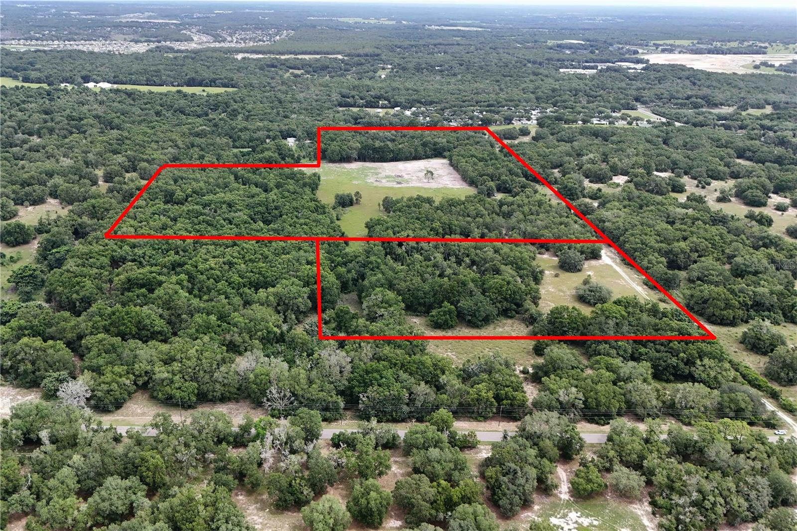 Prime Development Opportunity – Approximately 44 Acres MOL

Exceptional development opportunity featuring two adjoining parcels totaling approximately 44 acres MOL (30 acres and 14 acres). Conveniently located between Cemetery Road and Sadler Road just west of Round Lake Round in Orange County.

Property highlights include:

Two parcels being offered together
Approximately 30 acres MOL and 14 acres MOL
Two existing wells currently on site
Excellent potential for residential, agricultural, or future development opportunities (subject to zoning and approvals)
Strategic location on the West end of the Kelly Park Development 

Parcel IDs:

Orange County Parcel ID: 15-20-27-0000-00-007
Orange County Parcel ID: 15-20-27-0000-00-009

This rare offering provides significant acreage and flexibility for investors, developers, or end users seeking a large tract in a growing area.