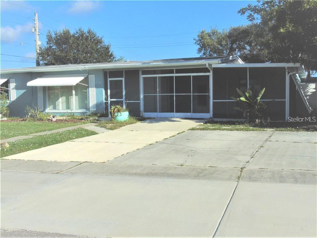 Spacious 3 bedroom home with In-Law Suite:
Enter the main house from the enclosed screened in Lanai that is facing newly built McGuire Park directly across the street from the home.  Main house enter into the living room that is open to the dining area and kitchen.  Step down to the Family room that faces the pool in backyard.  Kitchen has glass top free-standing range with vent hood, dishwasher, refrigerator:  Laundry room comes with washer and dryer.  Master bedroom suite has sliding doors that go the backyard and pool area.  Master Bathroom has a large walk in shower, separate dressing area and a walk in closet.  The guest bedroom in the main house is very large, can accommodate a king bed with private bathroom complete with shower/tub.  The main house has a guest bathroom with tub/shower.    Then enter the Mother-in-law Suite that has a large bedroom and a separate full size kitchen with glass top free standing range, microwave oven, refrigerator and lark sink area.  The In-Law Suite has 2 window air conditioning units and 2 central air conditioner units for the main house.   This home is great for a family that needs to take care of their elderly parents that can have their own privacy.