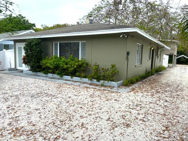 Live in one, rent the others—or maximize income from all three residences. This unique Clearwater property offers exceptional flexibility with a 3BR/2BA main home featuring a spacious living area, breakfast bar, laundry room, and private fenced backyard. A separate two-story building includes a 2BR/1BA apartment upstairs and a large studio apartment downstairs with its own kitchen, bath, and laundry—ideal for rental income, extended family, or guests.
Recent improvements include a 2022 roof on the detached building and newer A/C systems for both buildings. The main home is currently leased with the lease ending soon, providing flexibility for owner occupancy or continued rental income. Conveniently located just minutes from downtown Clearwater and approximately 10 minutes from Clearwater Beach, this versatile property is an outstanding opportunity for homeowners and investors alike.