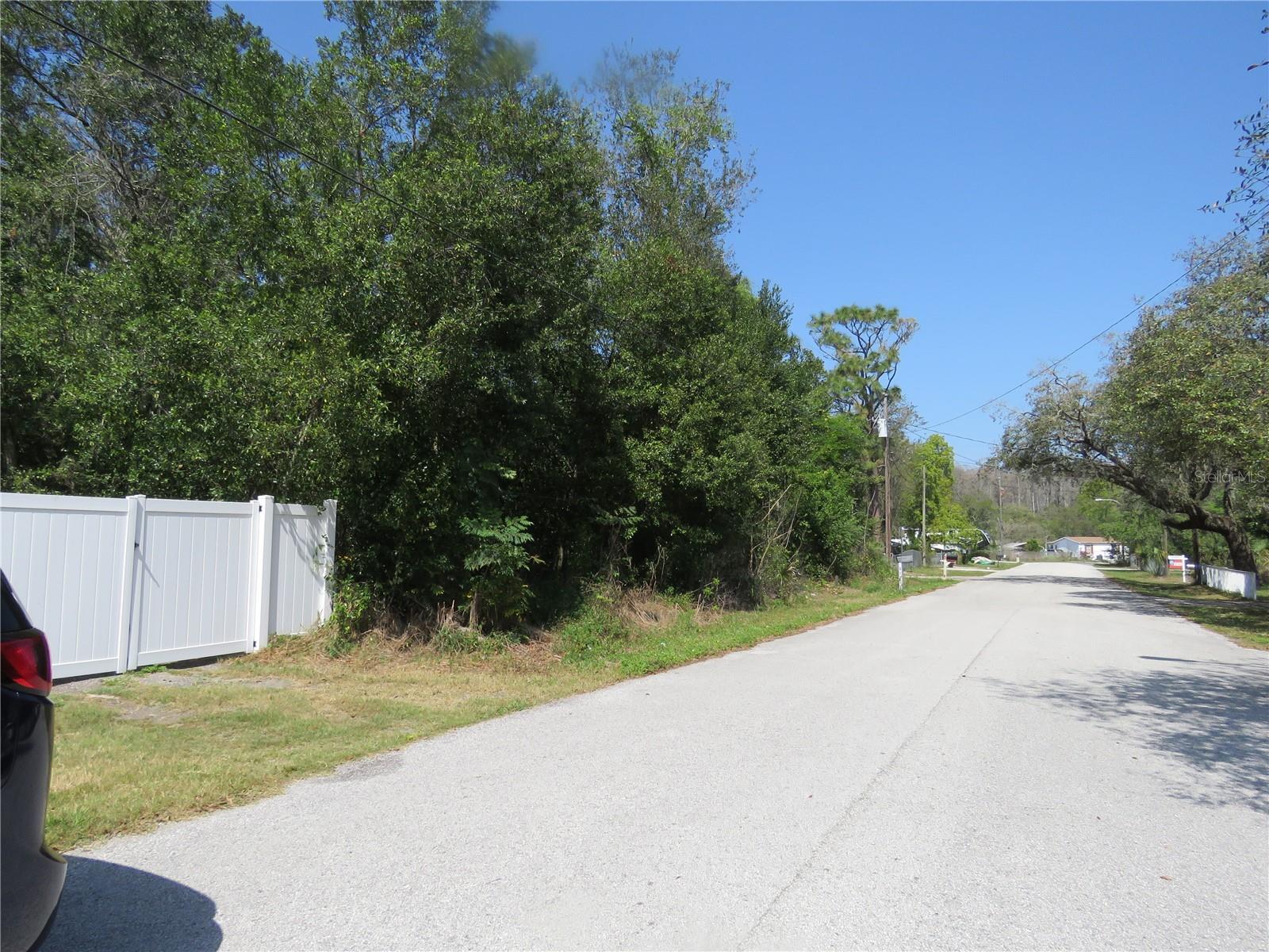 A great time to build a new home! Enjoy the view of Clear Lake from across the street. This is one parcel of three lots of unimproved vacant land in Moon Lake, New Port Richey, Florida. With a little over 1/4 acre of land with a frontage of 105 x 110. Wonderfully located in the residential neighborhood of Moon Lake. Zoning is Agricultural, Single Family and Manufacture Homes. Other beautiful lakes and ponds nearby as well as an easy commute to the airport, shopping, parks, and everything that makes this area so nice to live in! Buyer to verify what can be built there.