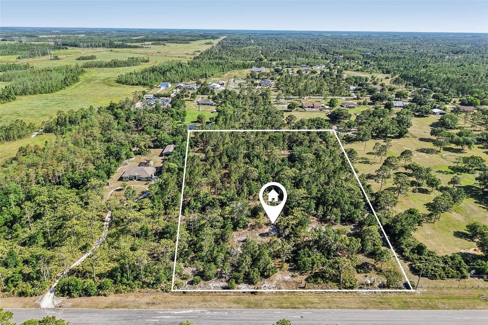 ***CONSERVATION AREA DETERMINATION HAS BEEN COMPLETED** Discover the opportunity to create your own private retreat on 6.24 ACRES in the Rocket City section of Wedgefield, where rural Florida living meets everyday convenience! Located at the end of a quiet DEAD-END STREET, this property includes two parcels being sold together, providing the space, privacy, and flexibility to BUILD THE DREAM HOME you have always envisioned. Surrounded by the natural beauty of Hal Scott Preserve, outdoor enthusiasts will appreciate having miles of trails, wildlife, and open spaces practically in their backyard. Whether you are dreaming of a custom estate, workshop, room for recreational vehicles, or simply extra space to spread out, this expansive property offers endless possibilities. Enjoy the freedom of an OPTIONAL HOA while still being close to everything that makes the Wedgefield community desirable, including top-rated WEDGEFIELD K-8 SCHOOLS, Wedgefield Golf Club, and Wedgefield Park. Convenient access to FL-520, FL-528, and Colonial Drive makes commuting easy, while Waterford Lakes Town Center, Valencia College, UCF, shopping, dining, and entertainment are all within reach. If you have been searching for acreage in East Orlando where you can enjoy privacy, nature, and room to build your vision without sacrificing convenience, this exceptional 6.24-acre property is ready to bring those plans to life. Call today for more information!