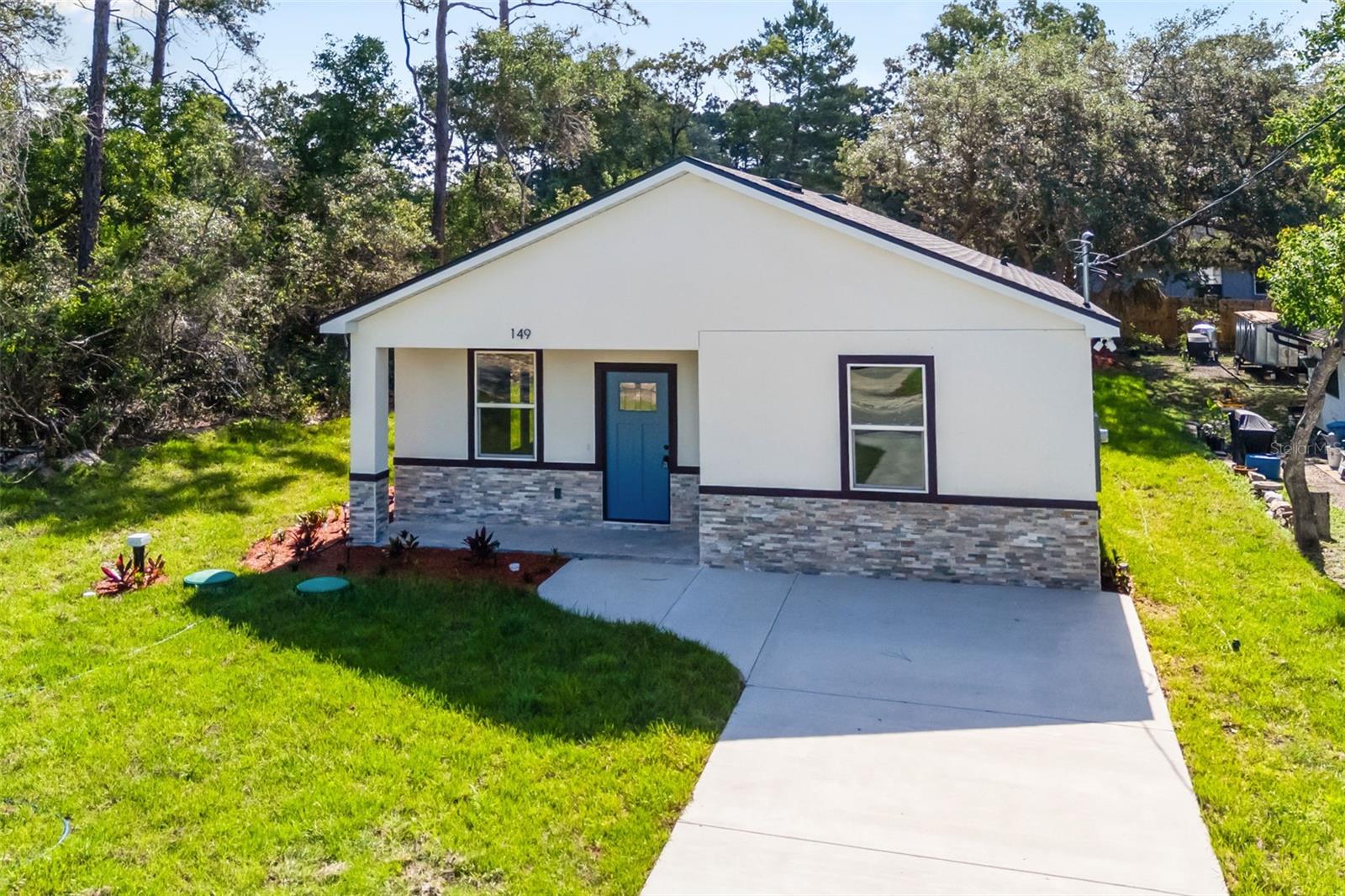 Experience modern living in this brand-new construction residence offering 3 bedrooms, 2 bathrooms, and 1,259 sq. ft. of beautifully designed space in desirable Orange City. Thoughtfully crafted with a focus on comfort and functionality, this home delivers a clean, contemporary feel in a rapidly growing Central Florida market. Ideally situated just minutes from US-17/92 and I-4, providing seamless access to Orlando, Daytona Beach, and surrounding employment hubs. Enjoy effortless proximity to everyday conveniences including shopping, dining, and essential services along the main corridor. Outdoor lifestyle is at your doorstep with nearby parks and recreation, including the highly sought-after Blue Spring State Park, known for its natural springs, manatee sightings, kayaking, and scenic trails. This location offers the perfect balance of tranquility and accessibility, combining natural Florida beauty with commuter-friendly convenience. A standout opportunity for buyers seeking new construction, low-maintenance living, and long-term value in an emerging area.