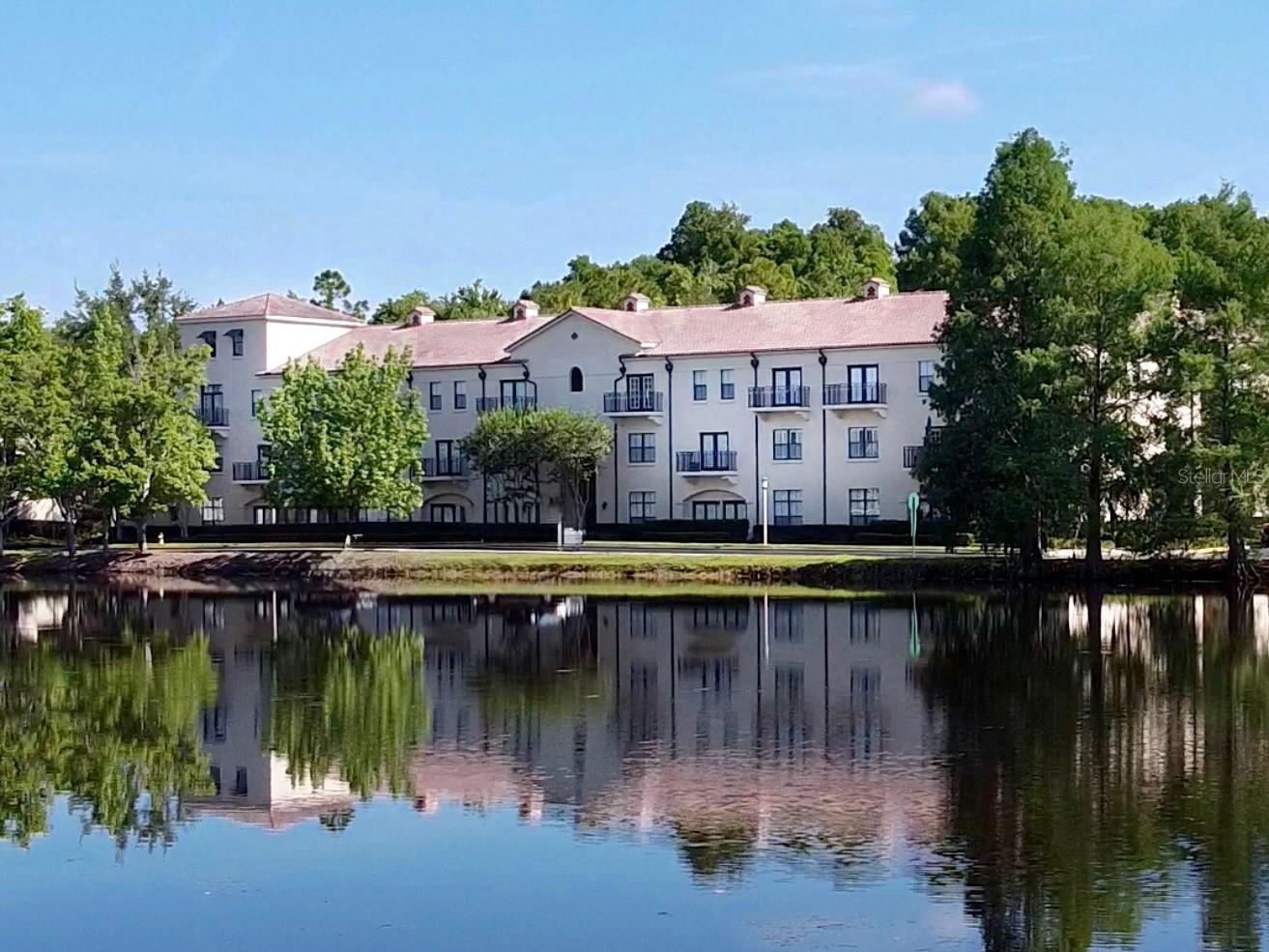 Step into your own storybook retreat in the heart of Celebration—where charm, convenience, and lifestyle come together in perfect harmony. 
Welcome to this beautifully upgraded 2-bedroom, 2-bath Waterside condo, ideally located in a well-maintained elevator building—offering both comfort and ease for everyday living. From the moment you enter, you’ll appreciate the thoughtful split floor plan, providing privacy for guests while maintaining a seamless flow for entertaining.
Enjoy tranquil mornings and relaxing evenings with peaceful lake views, bringing a sense of calm to your daily routine. The one-story layout includes a full-size washer and dryer inside the unit, making life effortless and efficient.
This condo is designed for true lock-and-leave convenience, perfect for those seeking a low-maintenance lifestyle without sacrificing elegance. You’ll also love the covered parking and large private storage closet—rare and highly desirable features in Celebration living.
One of the standout advantages? The Waterside Condo Association is known as one of the most respected in the area—with no additional buy-in fee, unlike many other communities. That means more value and less upfront cost for you.
Best of all, you’re just a short, scenic walk to Downtown Celebration, where charming boutiques, restaurants, lakeside paths, and community events await. And when adventure calls, you’re only minutes from the magic of Walt Disney World.
Offered for under $400,000, this is your opportunity to own a piece of fairytale living in the town that Disney built.
If you’ve been dreaming of a lifestyle that blends charm, convenience, and community—this is it. Don't miss our video tour!