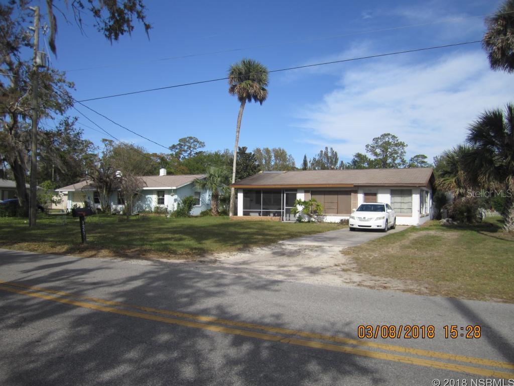 2Bed/1 Bath w/bonus room, and screened porch, block home with terrazzo floors.  Backs up to small pond.  Gravel drive. New Roof getting to be put on. Needs a little TLC. Has older Cook top and wall oven All information believed accurate but not guaranteed, measurements approximate. ;Water: City