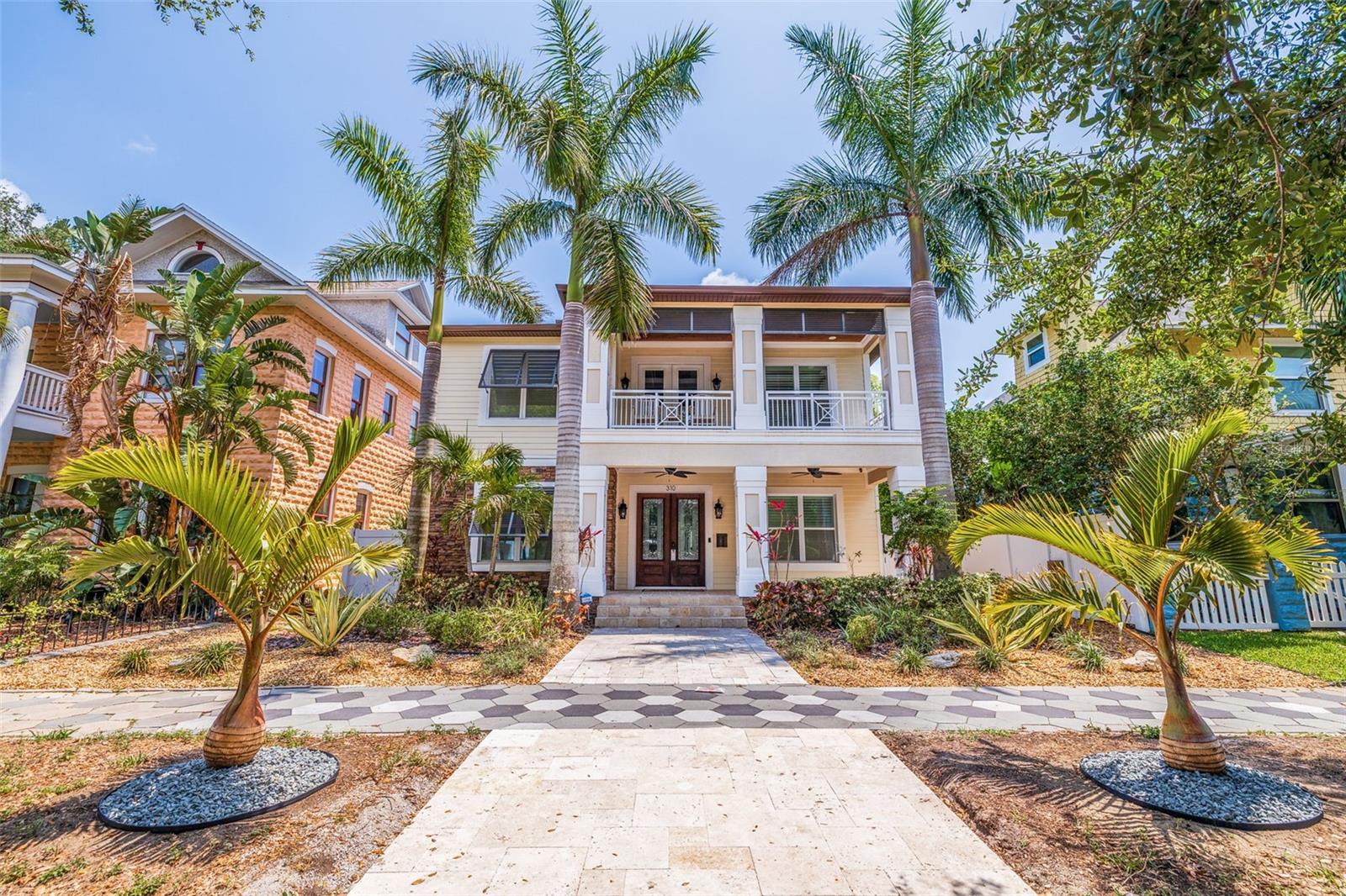 You Can Truly Have It All – Stunning Pool Home in the Heart of Old Northeast! Located just steps from vibrant Downtown St. Petersburg, this meticulously crafted 2017-built home offers the perfect blend of modern luxury and charm. Not only is this home a masterpiece, but it also boasts peace of mind with impact windows and doors—it sustained no damage and didn’t even lose power during the hurricanes. Designed with both comfort and style in mind, this 4-bedroom, 5-bathroom home features an open floor plan perfect for entertaining. The chef’s kitchen is a showstopper, complete with a 6-burner Wolf gas range, Subzero refrigerator, and an expansive 10-foot granite island—ideal for culinary creations or casual gatherings. The space flows seamlessly into three outdoor areas, including two upper covered decks and a lower screened patio, offering the ultimate spot for enjoying Florida’s beautiful weather. The tropical fenced backyard is an entertainer's dream, with a stunning pavered pool deck, heated pool and jacuzzi, creating a serene oasis for relaxation. Inside, a formal dining room with a cozy fireplace sets the stage for memorable family gatherings, while an upstairs bonus/flex space provides endless possibilities to suit your needs. This home is equipped with Control4 smart home technology, allowing you to effortlessly control lighting, climate, and security. Sonos speakers are built into every room for seamless music throughout the house, creating an immersive experience wherever you are. For added convenience, the home features a downstairs laundry room and additional laundry hookups upstairs. Every closet is outfitted with custom closet systems, offering both organization and luxury. Additional upgrades include plantation shutters, 8 foot doors and 10 foot + ceilings further enhancing the home’s charm. For added convenience, the AIR CONDITIONED two-car garage is accessed via an alley, ensuring privacy and ease. This home combines modern luxury with the timeless charm of Old Northeast, just a short stroll from downtown’s vibrant culture, dining, and entertainment. Rest easy knowing that this home is built to withstand the elements, offering both beauty and security. Don’t miss the opportunity to make this dream home yours. Schedule a private showing today!
