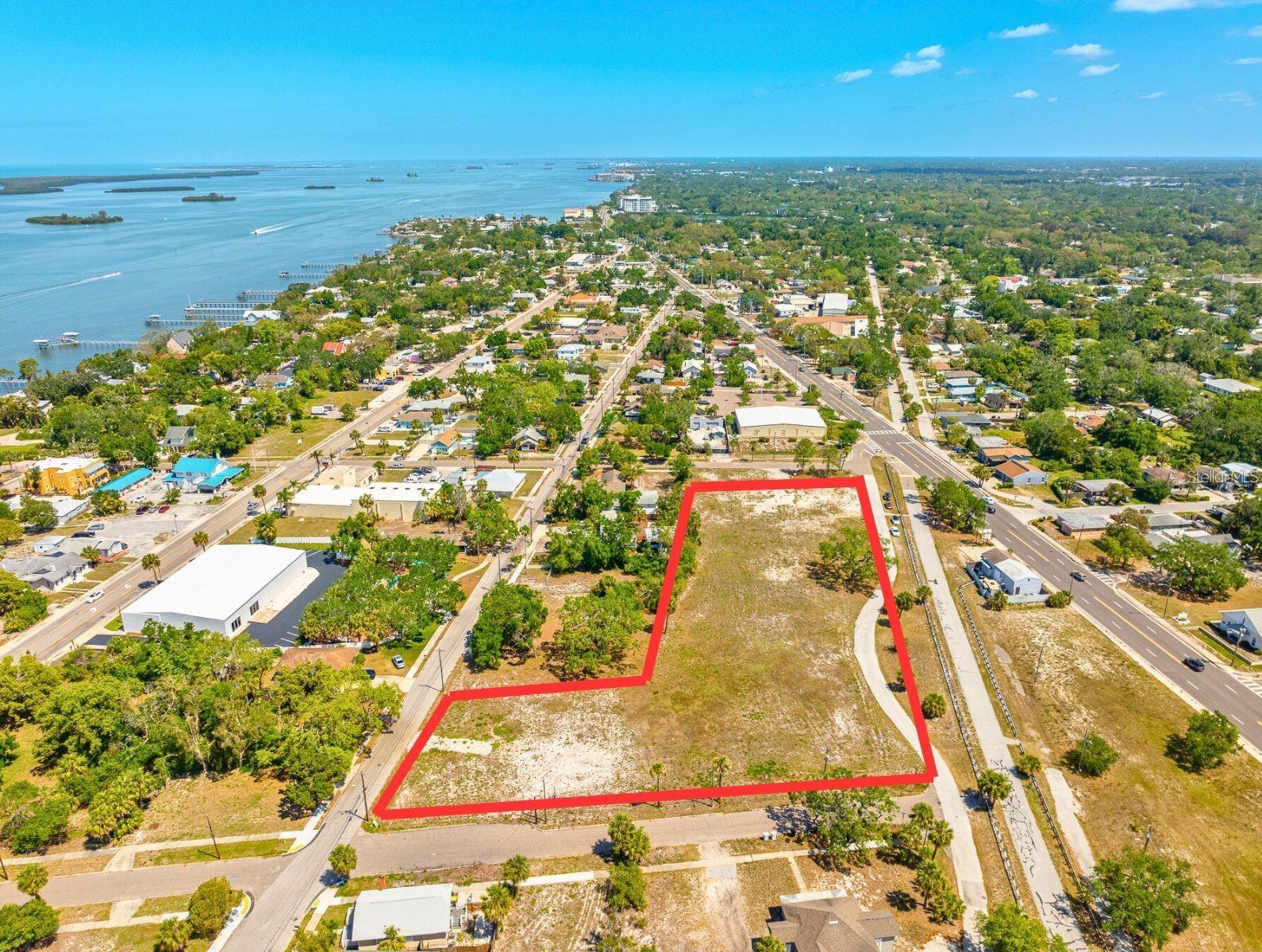 Have you seen this Prime Clearwater corner package with nine contiguous parcels totaling nearly two acres, zoned commercial and downtown for both retail and multi-family development? All vacant, all utilities in place, off-site retention already approved. Sits right on the Pinellas Trail with excellent visibility and road frontage. You can build now or add the adjacent North Garden parcel for a full three-acre site. Location doesn’t get much better — minutes from downtown and the beach. Serious developers only.