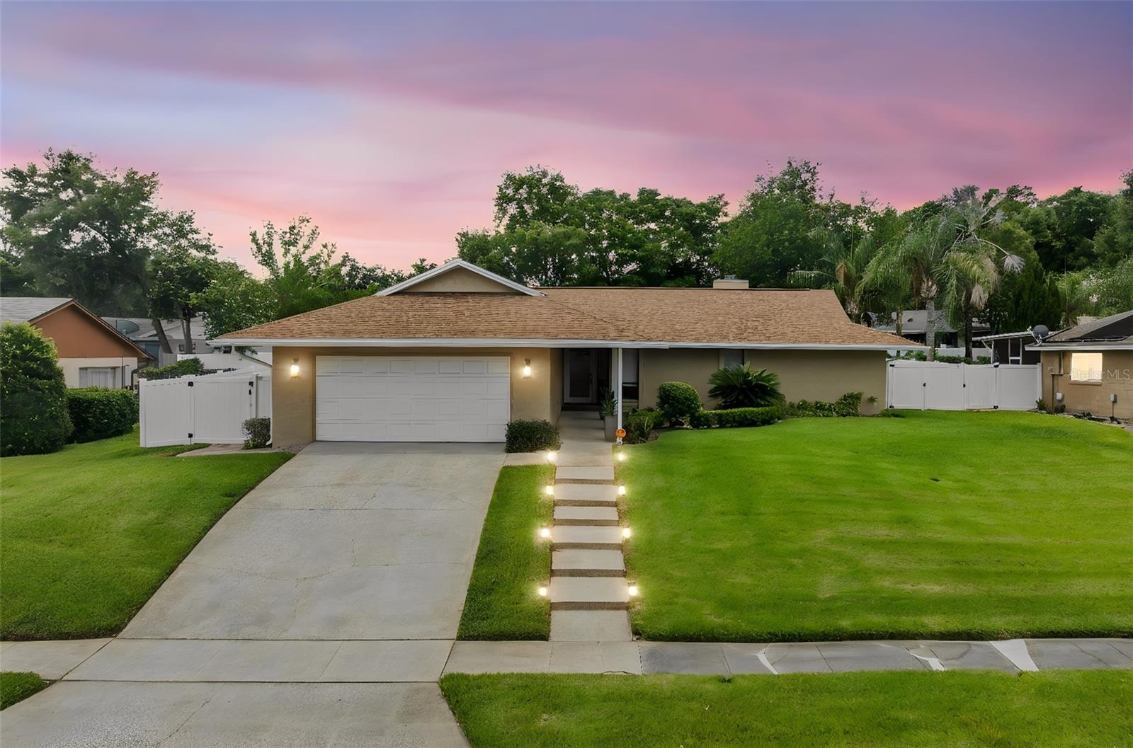 Welcome to 404 Barclay Avenue, a beautifully maintained 3-bedroom, 2-bathroom home in one of Altamonte Springs' most desirable pockets. Situated in a peaceful neighborhood near Lake Orienta, this property combines stylish interiors, exceptional outdoor living, and an unbeatable location, creating a rare opportunity for buyers who love to entertain and enjoy the Florida lifestyle.

Step inside and you'll immediately appreciate the abundance of natural light and inviting floor plan designed for both comfort and functionality. The gourmet kitchen catches your eye immediately, featuring custom two-toned maple cabinetry, granite countertops, a center island, breakfast bar, and a convenient pass-through window to the outdoor entertaining area. Open sightlines to the dining and living rooms create a bright and connected atmosphere ideal for hosting family and friends.

The split-bedroom layout provides privacy for everyone. The spacious primary suite is tucked away on its own side of the home and overlooks the backyard oasis. It features a luxurious California walk-in closet and a beautifully appointed bathroom with a garden tub and separate shower. Two additional bedrooms and a second bathroom are located on the opposite side of the home, and an indoor laundry room adds to everyday convenience.

The true showpiece of this property is the incredible backyard retreat. Designed for entertaining on a grand scale, the expansive covered patio features built-in Phantom screens, ceiling fans, speakers, lighting, TV area, and a tongue-and-groove ceiling. Beyond the patio awaits a stunning custom-built saltwater pool with a Caribbean Blue PebbleTec finish, THREE waterfalls, LED color-changing lighting, and a one-of-a-kind swim-up bar. Directly across from the pool bar is a recessed outdoor kitchen complete with granite countertops, grill, abundant prep space, and room for outdoor dining. The fully fenced backyard offers plenty of additional green space for pets, gardening, or even a fire pit!  

With no required HOA, lake access nearby, and a public boat ramp just down the street, this home offers a lifestyle that's difficult to replicate. Conveniently located between Altamonte Springs and Winter Park, you're minutes from Cranes Roost Park, Altamonte Mall, Park Avenue, Maitland City Centre, premier dining, shopping, entertainment, and easy access to I-4.