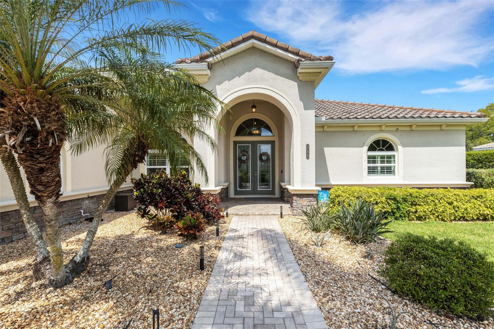 Discover a home that truly delivers the Florida lifestyle you’ve been looking for. Located on a spacious half-acre lot in Rye Wilderness Estates, this 2014 residence offers the privacy, space, and relaxed outdoor living that’s increasingly hard to find.
Step outside to your own private retreat featuring a heated saltwater pool and spa, wrapped by a large, covered lanai with multiple seating areas. Whether you’re hosting weekend gatherings, enjoying morning coffee, or unwinding in the evenings, this backyard was designed for the way Floridians live — easy, comfortable, and made for entertaining.
Inside, an open-concept layout flows effortlessly from a gourmet kitchen with a large quartz island into generous living spaces and a versatile bonus room that can serve as a home office, gym, or fourth bedroom. The primary suite offers a peaceful escape with a garden tub, zero-entry shower, and custom walk-in closets.
This home has been thoughtfully upgraded for low-maintenance Florida living, including a new water heater (2025), a high-efficiency LENNOX A/C system with medical-grade filtration, whole-house water purification, plantation shutters, and a smart irrigation system. You’ll also appreciate the three-car garage and the benefit of no CDD fees with a low monthly HOA.
Now priced at $899,000 with $5,000 paid to the buyer at closing toward buyer’s closing costs, this property represents one of the strongest values currently available in the area — positioned below recent neighborhood sales that attracted multiple offers.
If you’ve been searching for a move-in ready home with a true resort-style backyard and meaningful space, this one deserves your attention.
Schedule your private showing today.