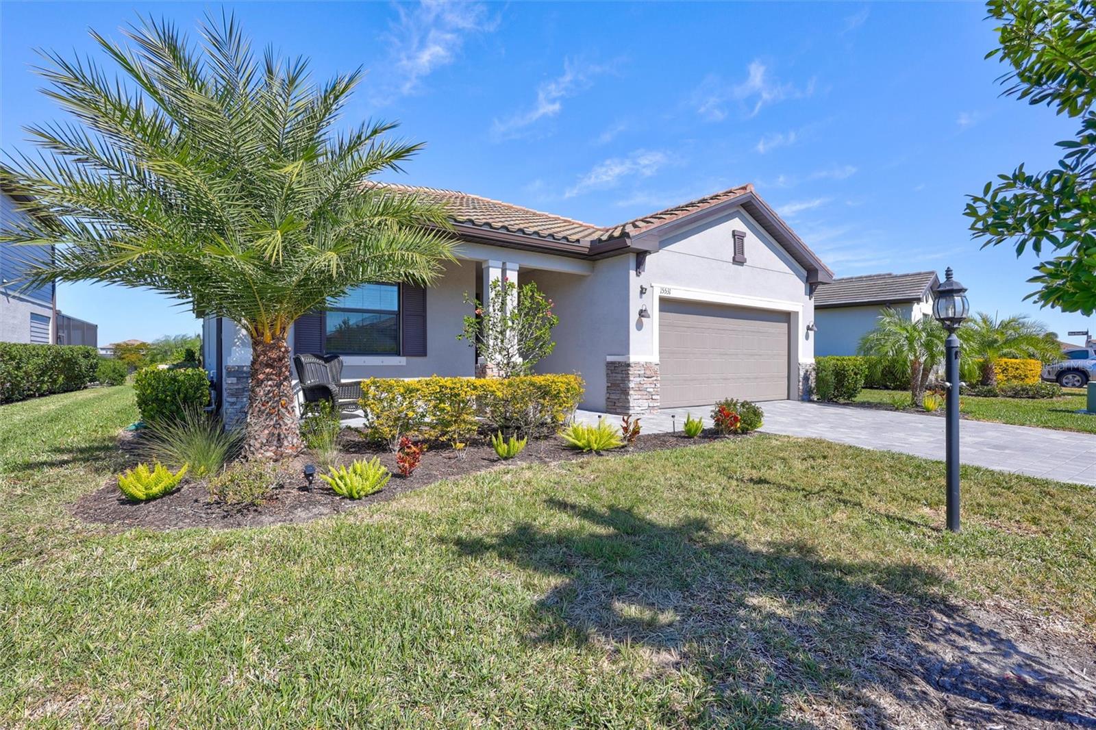 Experience the best of Lakewood Ranch living in this beautifully cared-for 3-bedroom, 3-bath ranch-style pool home, perfectly situated in the highly desirable Lorraine Lakes community. Thoughtfully designed with an open and inviting layout, the home offers effortless flow between the kitchen, dining space, and main living area—ideal for both relaxed daily living and entertaining guests.

The kitchen is generously appointed with plenty of cabinetry and expansive counter space, creating a functional hub for gatherings large or small. Step through the doors to your own private outdoor retreat, where a heated pool and spa overlook peaceful pond views. The screened lanai extends your living space while providing a tranquil setting to enjoy Florida’s sunshine year-round.

Each bedroom is positioned to offer comfort and privacy, making the home well-suited for families, visiting guests, or flexible work-from-home needs. A spacious two-car garage adds convenience with ample room for storage and more.

Just moments away, Lorraine Lakes’ impressive 25,000-square-foot amenity center delivers true resort-style living, featuring a state-of-the-art fitness facility, tennis and pickleball courts, indoor and outdoor basketball, a lap pool, splash pad, playground, putting green, and an on-site bar and restaurant—all centered around a stunning resort pool.

Located within Lakewood Ranch, the nation’s top multi-generational community for eight consecutive years, this home places you close to world-class beaches, vibrant downtown Sarasota, and endless dining, shopping, and cultural attractions.

This is more than a home—it’s the Florida lifestyle you’ve been waiting for.