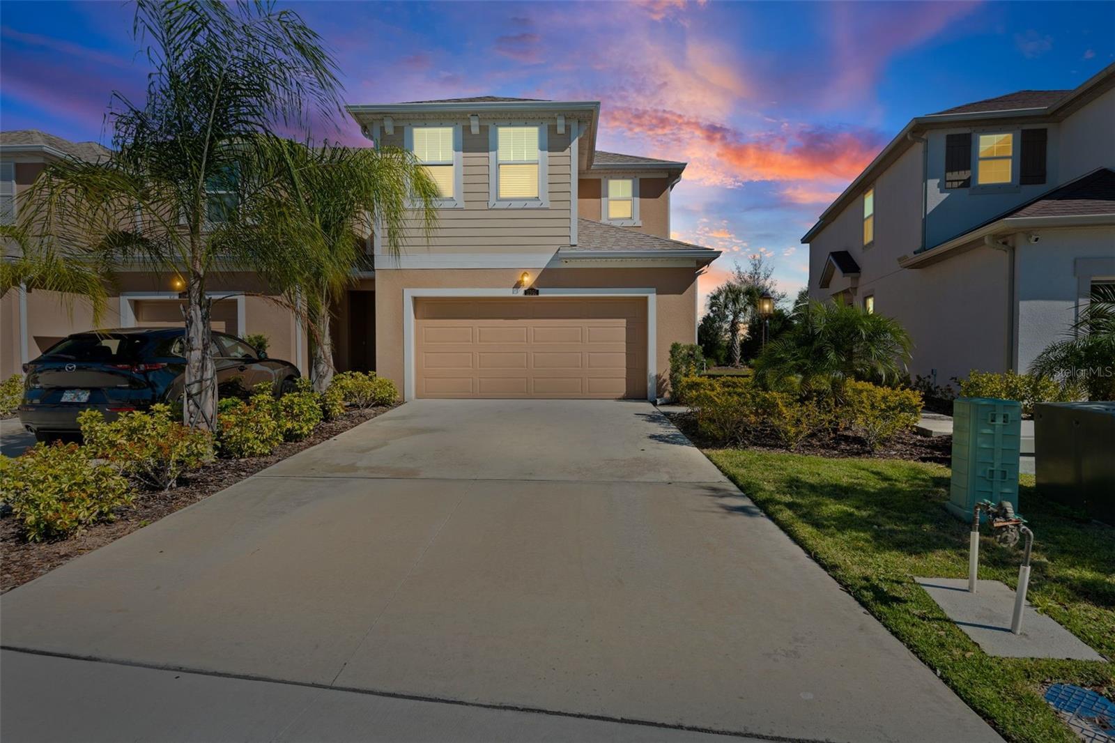 Welcome to this 3-bedroom, 2.5-bath end-unit townhome with a 2-car garage, offering a smart layout, added privacy, and low-maintenance living in a convenient location. The end-unit position allows for additional natural light and a more open, comfortable feel throughout the home.

The first floor features a well-designed living space ideal for everyday use and entertaining alike. The kitchen is centrally located and connects easily to the dining and living areas, creating a functional and inviting flow. Clean, neutral finishes make this home move-in ready and easy to personalize.

Upstairs, the primary bedroom includes a private en-suite bath, while two additional bedrooms provide flexibility for guests, a home office, or growing needs. A main-level half bath adds convenience for residents and visitors.

The attached 2-car garage offers secure parking and additional storage, and the end-unit setting enhances privacy and outdoor potential. Convenient access to shopping, dining, and major roadways makes this home an excellent opportunity for comfortable, easy living.