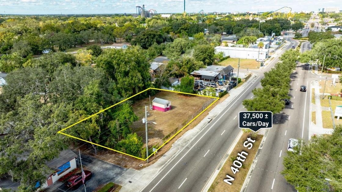 Small commercial sites with confirmed buildable dimensions and drive-through potential remain scarce across central Tampa, creating a strong opportunity for a QSR, coffee, or medical user seeking visibility near major employment centers and the University of South Florida. This 0.28-acre parcel features ±150 feet of frontage along North 40th Street and measures approximately 150’ × 82’, exceeding the City of Tampa’s minimum width and area requirements for new commercial construction. Zoned CG (Commercial General), the property supports a broad range of retail, office, and service-based uses, including drive-through and single-tenant development. The site offers level topography, full utilities, and excellent exposure along a proven commercial corridor surrounded by national retailers and major institutions. Its flexible zoning and infill location make it ideal for an owner-user, small retail pad, or long-term investment hold, while proximity to USF, Busch Gardens, and AdventHealth Tampa underpins consistent demand and value stability. A small non-permanent shed is currently on-site and may be removed by the seller prior to closing at the buyer’s request.