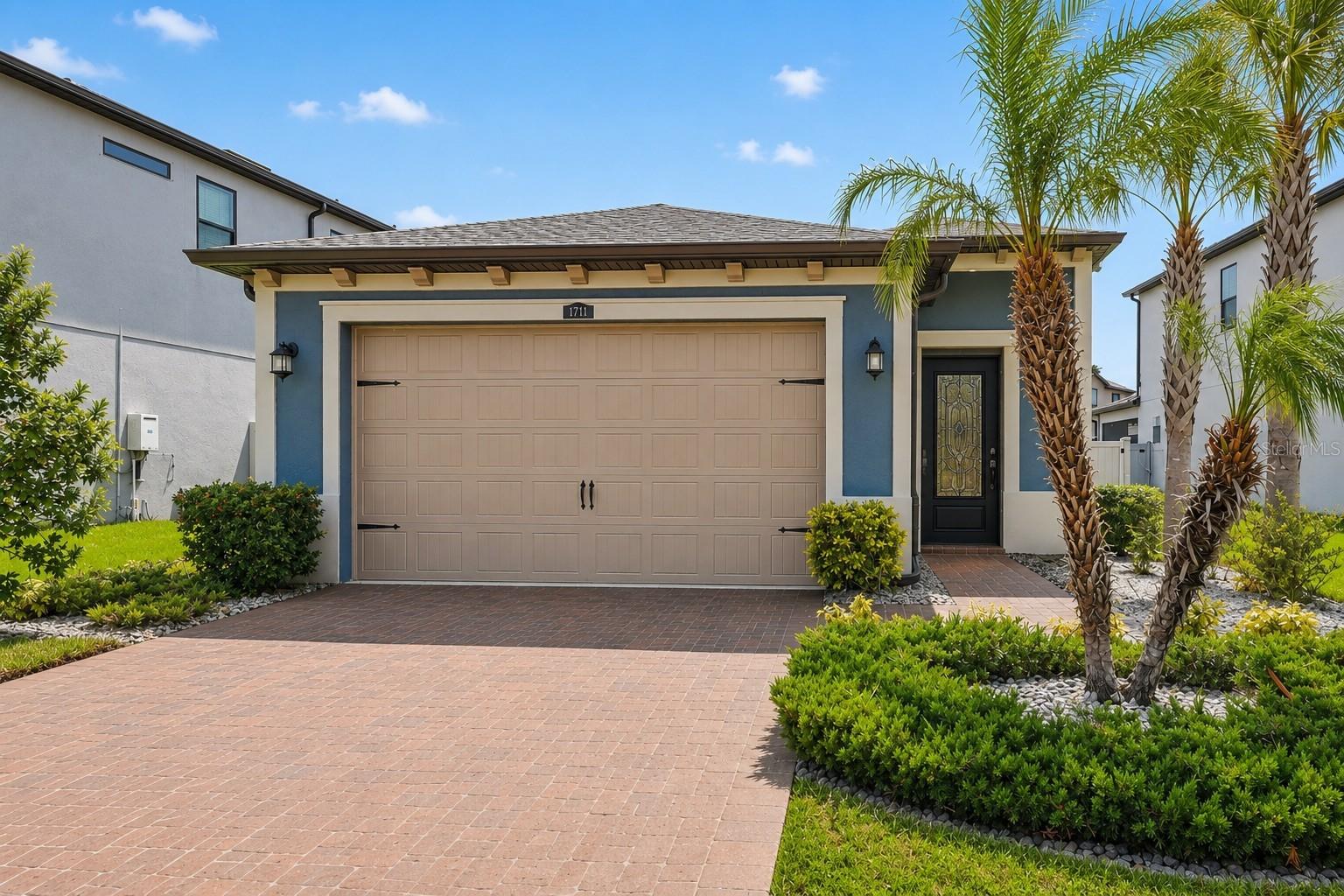 Virtually Staged. Meticulously maintained, beautifully upgraded, and completely move-in ready don't miss the opportunity to make this exceptional home yours! ***Assumable Loan with a low, rate, or explore a $0 down/NO PMI loan Option*** 
Experience refined Florida living in this beautifully upgraded home nestled in one of Wesley Chapel's premier resort-style Estancia at Wiregrass Community! Thoughtfully designed with an open-concept floor plan, abundant natural light, designer finishes and freshly painted interior, this move-in-ready home offers the perfect blend of luxury, comfort, and functionality.
Key Features:
• Open Concept Design with Gourmet Kitchen flowing to a Huge Great Room & Dining Area, Porcelain Tile floors throughout, Pocketing Sliding Door for endless Sunlight.  
• Kitchen is appointed with Quartz Counters, Farmhouse sink, Natural Gas Cook top, Built-in Oven, Walk-in Pantry, 42” Cabinets, Stylish Vent hood, French Door Refrigerator, Pendant Lighting and abundant storage. 
• Spacious Primary Suite with Tray Ceilings, and a Spa-Inspired Ensuite with Dual Vanities, Oversized, Frameless Glass Walk-in Shower, Private Water Closet & Walk-in Closet. 
• Dedicated Laundry Room, Washer & Dryer included.
• Screened Lanai for Florida’s Year-Round Outdoor Living.
• Well-Appointed Secondary Bedrooms with recessed lighting.
Property Highlights:
•  Fully Fenced Backyard—Perfect for Pets, Play, or Entertaining
•  Paver Driveaway & Entry 
•  Designer Landscaping
•  Attractive Neighborhood Streetscape
•  Master Planned Community
Resort-Style Community Amenities Include:
•  Luxury Clubhouse with Monthly Resident events. 
•  Fitness Center open 5:30 to 11:30 daily. 
•  Zero Entry, Heated, Resort & Lap Pools with Tower Waterslide
•  Tennis, Pickleball and Basketball Courts
•  Playground, Parks and Sidewalks 
•  Walking Trails
•  Beautiful Lakes & Green Spaces

Don't Miss this Opportunity to Make this Beautiful Home YOURS!! Call for your private tour today