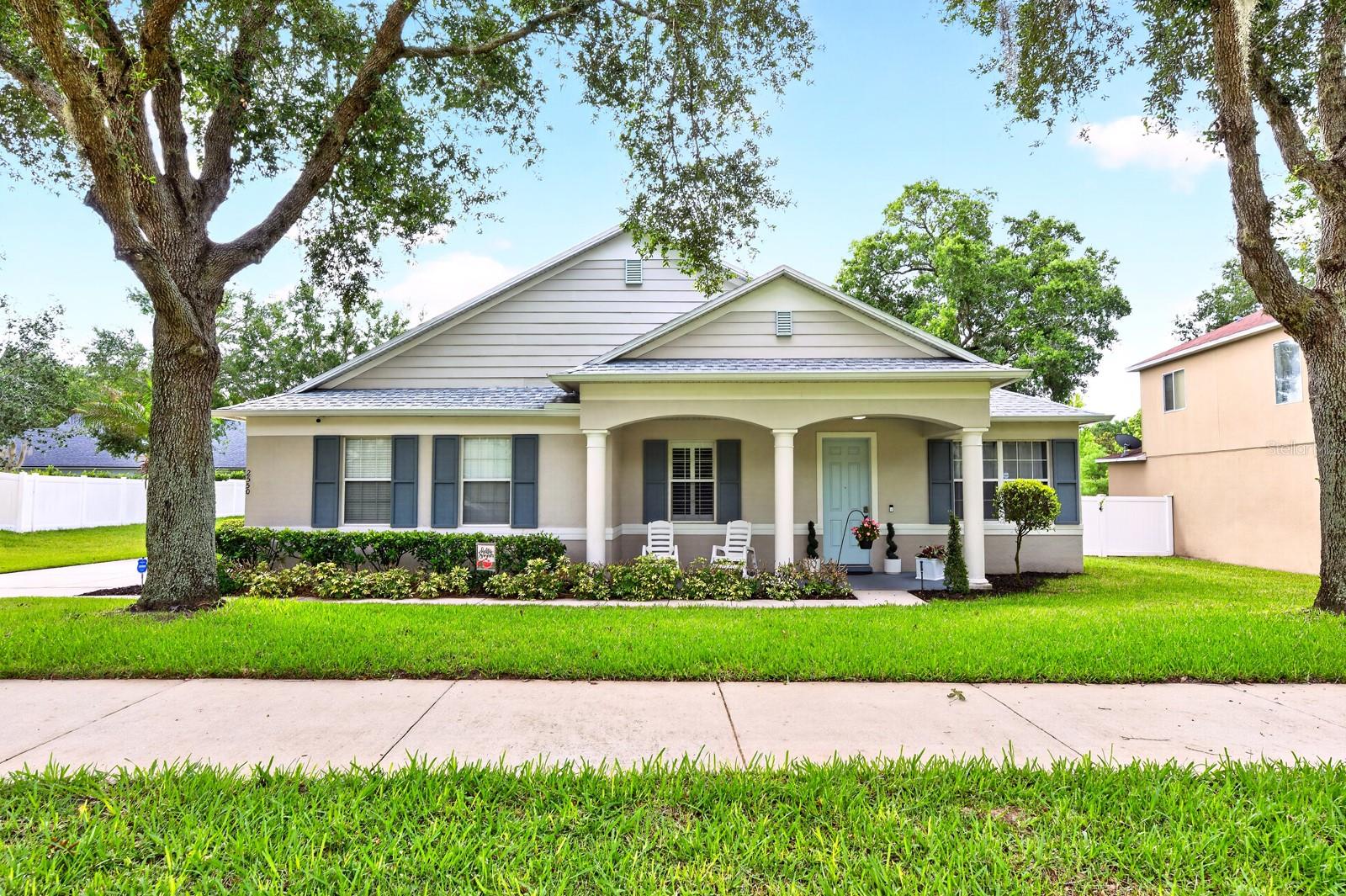 Beautifully upgraded and meticulously maintained (ONE OWNER HOME!) with major updates already done for you in this 4-bedroom, 2-bath POOL HOME in Apopka's sought-after Arbor Ridge community! Recent improvements include a PRIMARY BATH REMODEL (2025), UPDATED GUEST BATH (2024), KITCHEN RENOVATION (2023), HYBRID WATER HEATER (2023), NEW ROOF (2022), UPDATED A/C (2022), and EXTERIOR PAINT (2022) – offering peace of mind and true MOVE-IN READY living. From the moment you arrive, this home delivers standout CURB APPEAL with mature landscaping, attractive architectural details, and a welcoming presence. Situated on a premium .31 ACRE LOT with NO REAR NEIGHBORS, a FENCED BACKYARD, and beautiful tree-lined views, you will enjoy the privacy and outdoor lifestyle Florida homeowners love. Inside, the thoughtfully designed floor plan offers room to live, work, and entertain. Formal living and dining spaces greet you at the front of the home, while a versatile FLEX ROOM off the foyer provides the perfect option for a home office, 4TH BEDROOM, playroom, or hobby space. TILE & PERGO LAMINATE WOOD FLOORING flow throughout the main living areas and primary suite, with comfortable carpet in the secondary bedrooms. At the heart of the home, the fully RENOVATED GOURMET KITCHEN is designed with the modern home chef in mind. Featuring shaker-style cabinetry with crown molding, under cabinet lighting, a stylish TWO-TONE COLOR PALETTE, sleek CALACATTA QUARTZ COUNTERTOPS, subway tile backsplash, upgraded STAINLESS STEEL APPLIANCES including a BUILT-IN CONVECTION OVEN, pantry storage, and an oversized ISLAND with bar seating – this space is both beautiful and functional! The kitchen opens seamlessly to the spacious family room and casual dining nook, where sliding glass doors lead to the SCREENED LANAI and PRIVATE POOL, creating the ultimate INDOOR/OUTDOOR entertaining experience. Your generous PRIMARY SUITE is tucked away at the back of the home for added privacy and features 2 WALK-IN CLOSETS and a newly RENOVATED ~ SPA-INSPIRED EN-SUITE BATH. Secondary bedrooms are generously sized and share a beautifully updated second full bath. Step outside and discover your own personal backyard retreat. The open air pool, expansive outdoor living space, mature trees, and private fenced yard create the perfect setting for relaxing weekends, family gatherings, and year-round Florida enjoyment. Residents of Arbor Ridge enjoy mature tree-lined streets, a peaceful neighborhood atmosphere, and a LOW HOA, all conveniently located near shopping, dining, recreation, and major roadways including SR-429. Zoned for highly sought-after "A" RATED Wolf Lake Elementary School and Wolf Lake Middle School, this home truly checks all the boxes for location, layout, updates, and lifestyle. Schedule your tour today and let us say WELCOME HOME!