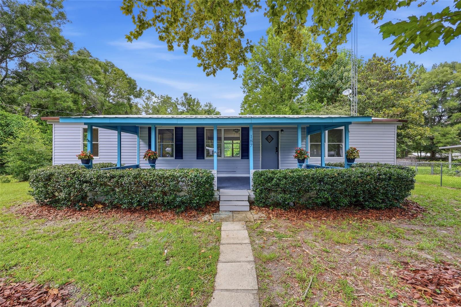 Welcome home to this beautifully updated 3-bedroom, 2-bath home tucked away on a private corner lot at the end of a quiet cul-de-sac in the heart of High Springs. Situated on its own land with no HOA and no lot rent, this property offers the perfect combination of privacy, comfort, and convenience.

Inside, you’ll find a bright, open floor plan featuring fresh interior paint, new luxury vinyl plank flooring, and spacious living areas designed for everyday living. The kitchen offers abundant cabinet and counter space, making it perfect for cooking, entertaining, or gathering with family and friends. The split-bedroom layout provides added privacy, while large windows fill the home with natural light.

Step outside and enjoy the fully fenced backyard with plenty of room for pets, gardening, outdoor entertaining, or simply relaxing in your own private space. The covered front porch is the perfect spot to enjoy your morning coffee or unwind in the evenings beneath the shade of mature trees. A storage shed and covered parking provide added convenience and extra storage.

Outside, you'll enjoy the fully fenced backyard with plenty of room for pets, gardening, entertaining, or creating your own outdoor retreat. The covered front porch offers a relaxing place to take in the tranquil setting, while the private well and septic system provide greater independence and lower monthly expenses by avoiding city water and sewer charges. A storage shed and covered parking add even more value to this versatile property.

Located less than 10 minutes from historic downtown High Springs, you’ll enjoy easy access to local restaurants, shopping, schools, and community events. Outdoor enthusiasts will love being just a short drive from some of North Florida’s most popular natural attractions, including Poe Springs, Ginnie Springs, and Gilchrist Blue Springs State Park.

Whether you’re looking for a full-time residence, a weekend retreat, or an affordable home with room to spread out, this move-in-ready property offers exceptional value in one of North Central Florida’s most desirable small towns.

Seller will consider seller financing or a lease option with an acceptable down payment and mutually agreeable terms. Schedule your private showing today!