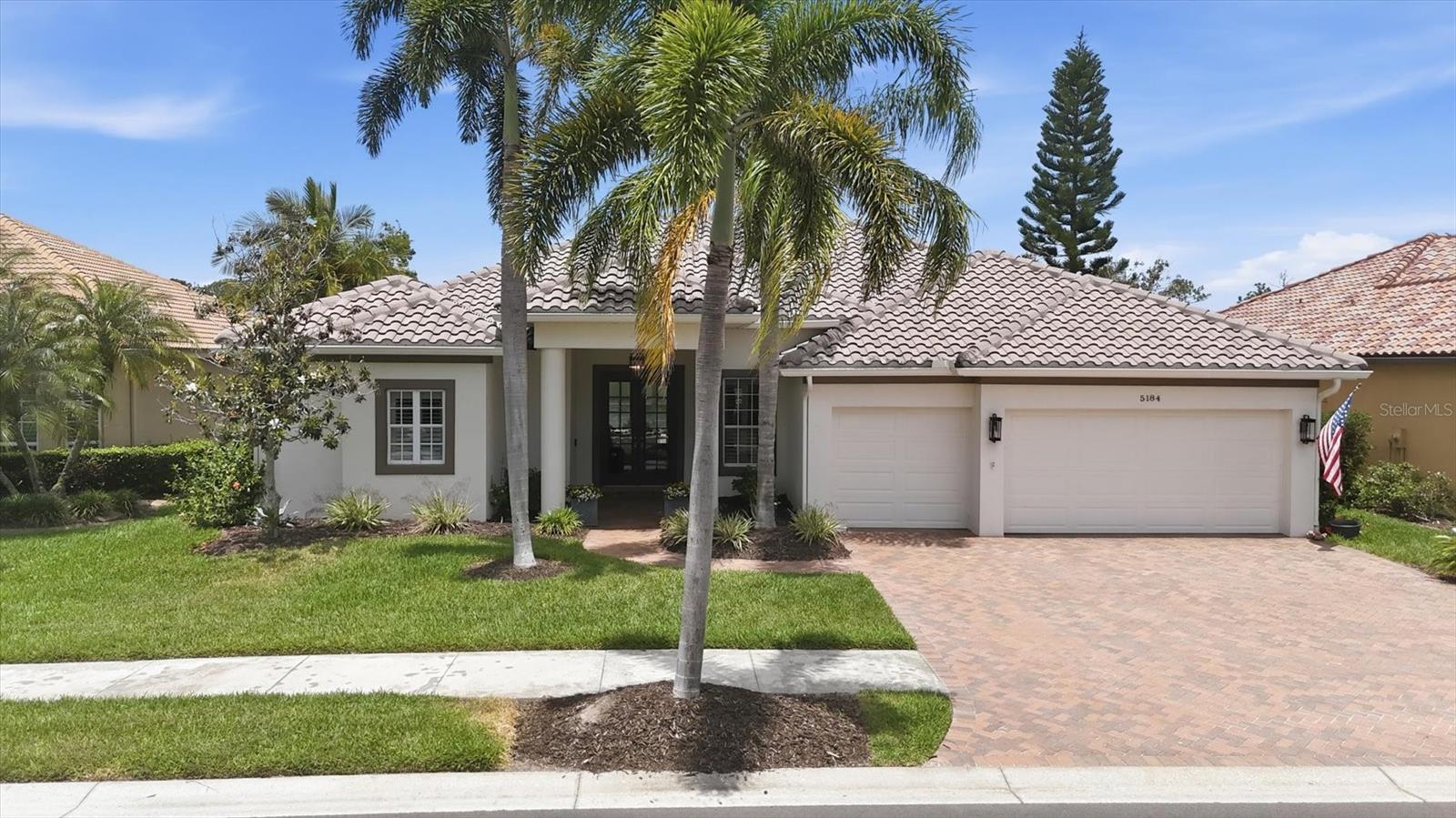 Heron Creek Golf & Country Club! Welcome to “Marshview Manor” — a warm and welcoming 3 Bedroom + Den, 3 Bath POOL Home with 3-Car Garage perfectly positioned to capture peaceful lake & golf  views overlooking the 7th Hole of the Marsh Course, where herons, egrets, sandhill cranes, & a constant parade of Florida wildlife create a tranquil backyard setting that feels like a private nature preserve. From the moment you arrive, the lush tropical landscaping, rich paver driveway, & elegant double glass entry doors set the tone for the casually sophisticated Florida lifestyle that awaits inside. Spanning 2,638 SQ FT, this lovingly maintained  home offers a bright, sunny ambiance that instantly feels like home — the kind  where family gathers, laughter lingers, & every day feels like vacation. Inside, cool ceramic tile flows throughout the living areas while coffered ceilings accented w/crown molding add architectural richness to the foyer, living, & dining spaces. Just off the living room, the private den with custom built-in shelving creates the perfect retreat for reading, relaxing, or working from home. The beautifully updated kitchen is designed for both function & entertaining, featuring granite countertops, maple cabinetry w/pull-outs, SS appliances, decorative glass display cabinetry, & a clear-view aquarium window breakfast nook overlooking the sparkling pool & expansive paver lanai. Just off the kitchen is a versatile oversized laundry room finished w/rich wood cabinetry, granite countertops that mirror the kitchen, a laundry tub, drying rack, utility closet, and abundant storage & prep space — ideal for a coffee bar, catering station, hobby area, or everyday organization. Pocketing sliders blur the lines between indoors and out, creating the perfect flow for entertaining family and friends. The outdoor living space is exceptional w/a fully equipped summer kitchen offering natural gas, hot/cold running water, & refrigerator — all perfectly positioned to enjoy the wide lake & golf panoramas, tropical breezes, & ever-changing wildlife views. The split- floor plan provides great privacy for guests while the  primary suite serves as a peaceful retreat double entry doors where unique architectural details abound -there is a full ensuite w/ dual vanities w/ pull-outs, soaking tub, walk-in shower, private water closet, the primary bedroom is spacious yet cozy & boasts 2 California closets and easy access to the lanai. Guests will appreciate private 2BED guest wing & convenient pool bath. Added upgrades inc: plantation shutters, Hunter Douglas shades, hurricane resistant windows, transferable HOME-TECH warranty, TILE ROOF (2024), tankless H2O heater, int/ext paint, pool pump, toilets, French drains, new garage opener & exterior lighting. The oversized garage offers abundant storage + separate golf cart bay. This is more than just a home — it’s a gathering place filled with warmth, comfort, and the easy rhythm of Florida living. Heron Creek residents enjoy LOW HOA fees inc high-speed fiber optic INTERNET and TV, full svc lawncare & irrigation. NO CDD fees. Luxury amenities inc 27 holes of Arthur Hills designed championship golf, state-of-the-art 25-acre Golf Learning Center / practice facility, Clubhouse dining, resort-style pool, fitness center, & Har-Tru tennis courts. Conveniently located near shopping, dining, Wellen Park, Braves Training Stadium, Costco, & the new Sarasota Memorial Hospital  currently under construction just minutes away