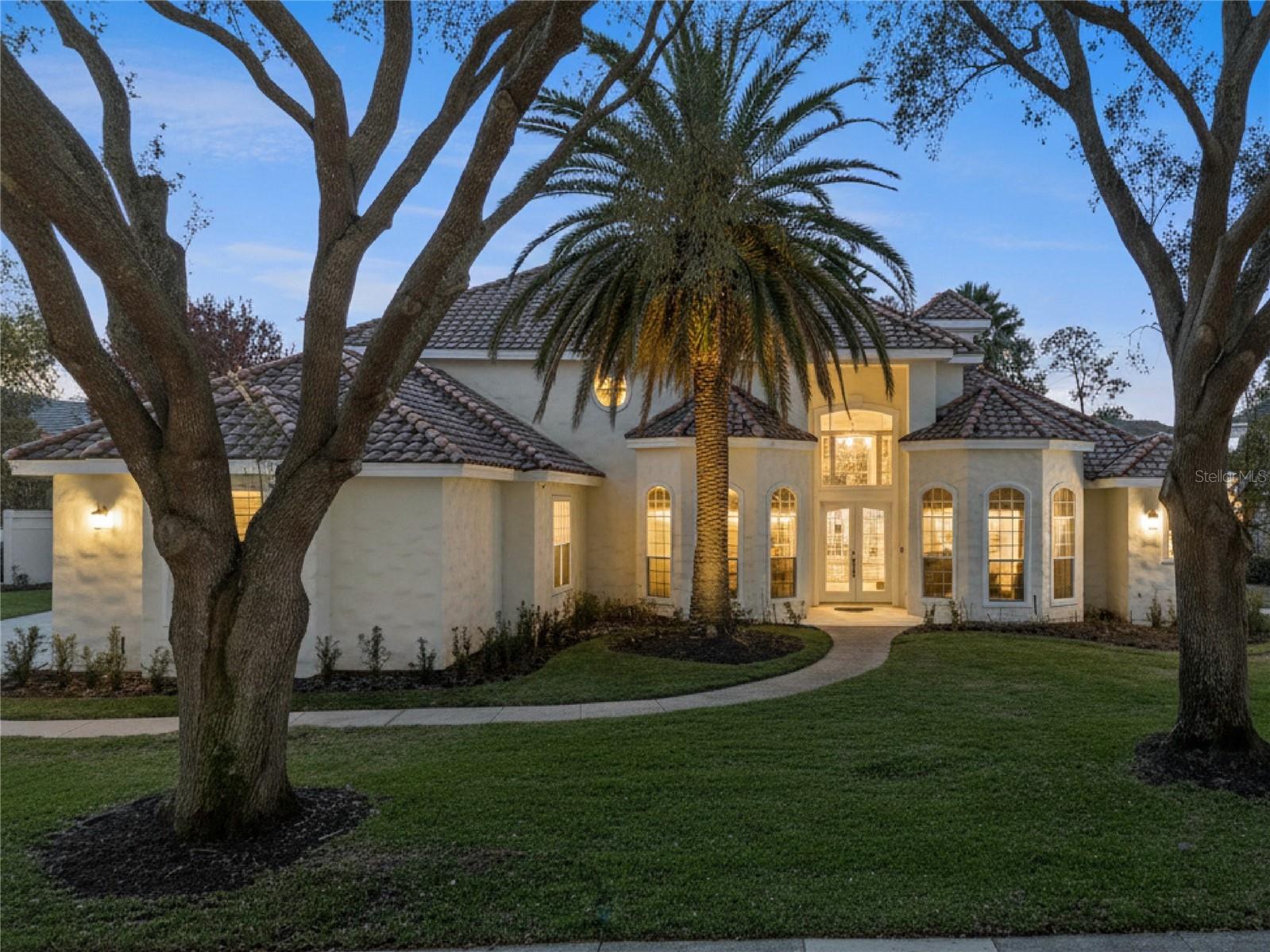 Welcome to life in Dr. Phillips, one of Orlando’s most sought-after communities, where convenience, charm, and anexceptional lifestyle come together. Located within the lovely Brentwood Club neighborhood, this beautifully updatedestate offers the perfect balance of luxury and tranquility, tucked away on a quiet street yet moments from world-classdining, shopping, and entertainment.This spacious 4-bedroom, 3.5-bath residence has been thoughtfully transformed and is truly move-in ready. The living anddining rooms have been renovated to create elegant, inviting spaces, highlighted by custom lighting that adds warmth andsophistication. A fresh, high-end exterior paint finish enhances the home’s curb appeal, while fresh interior paintthroughout gives the home a bright, modern feel.The kitchen has been stylishly updated with freshly painted cabinetry, granite countertops, and brand-new appliances—idealfor everyday living and entertaining. Outdoor enjoyment is elevated with a brand-new pool enclosure and a freshly paintedpool deck, creating a private retreat for relaxation or hosting guests.Comfort and peace of mind come with recently renewed AC systems, new attic insulation for improved energy efficiency, and anew water heater. New carpet in all first-floor bedrooms, the primary closet, and the home office adds a final touch ofcomfort. A spacious 3-car garage completes the home, offering ample storage and parking.With its prime Dr. Phillips location and extensive upgrades, this home presents a rare opportunity to enjoy refined livingin one of Orlando’s most desirable neighborhoods.