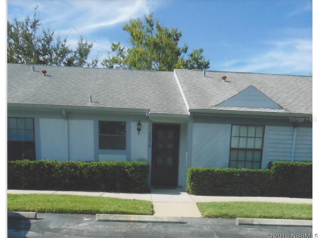 Centrally located villa with vaulted ceilings in the living room, laminate flooring & tile throughout, new heat pump in 2014, spacious Florida room w/views of the driving range and fairways.  An affordable way to enjoy the golfing and beach activities associated with beautiful New Smyrna Beach.  There is a community pool that may be available by optional membership too.  Hurry, this buy won't last! ;Water: City