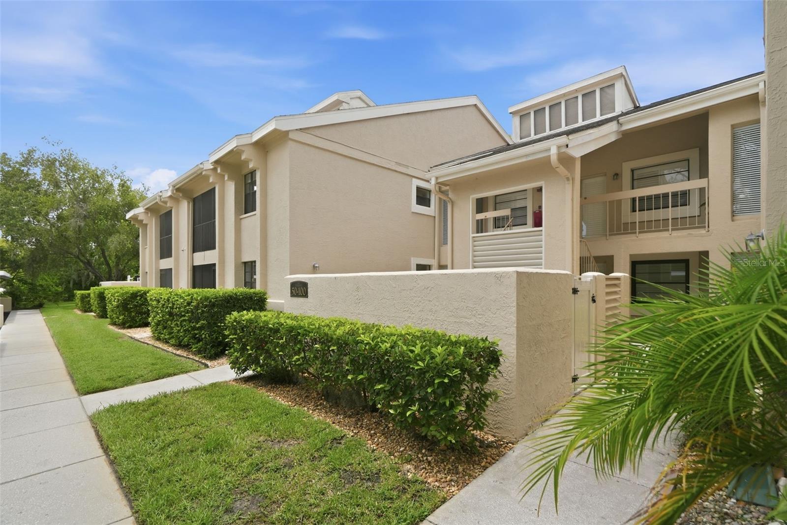 Experience resort-style living in this beautifully renovated 2-bedroom + loft, 2-bath condominium offering approximately 1,600 square feet of bright, open living space. Perfectly positioned overlooking tranquil water and the golf course, this exceptional home combines modern updates with soaring architectural details in one of Oldsmar's most desirable communities.

The impressive great room welcomes you with dramatic vaulted ceilings, abundant natural light, and a striking spiral staircase leading to a versatile loft—ideal for a home office, media room, or guest space. The remodeled kitchen features crisp white cabinetry, quartz countertops, stainless steel appliances, recessed lighting, and a breakfast bar that opens seamlessly to the living and dining areas.

The spacious primary suite offers peaceful water views, private access to the screened lanai, a custom walk-in closet, and a beautifully renovated en-suite bath complete with a luxurious oversized walk-in shower and dual vanities. The generous second bedroom is located near the updated guest bath, providing privacy for family or visitors.

Step outside to the expansive screened lanai and enjoy picturesque views of the pond and golf course—the perfect setting for your morning coffee or relaxing evenings.

Features You'll Love
2 Bedrooms + Spacious Loft
2 Fully Updated Bathrooms
Approximately 1,600 Sq. Ft.
Soaring Vaulted Ceilings
Dramatic Spiral Staircase
Beautifully Renovated Kitchen with Quartz Counters
Stainless Steel Appliances
Luxury Vinyl Plank Flooring Throughout
Custom Walk-In Closet
Oversized Primary Shower with Designer Tile
Full-Size Washer & Dryer
Large Screened Lanai
Water & Golf Course Views
Assigned Covered Parking

Located just minutes from shopping, restaurants, parks, Tampa International Airport, and some of the area's best beaches, this move-in-ready home offers the perfect blend of comfort, style, and convenience.

Schedule your private showing today and discover everything this exceptional Oldsmar home has to offer! Newer AC 3/2022.
