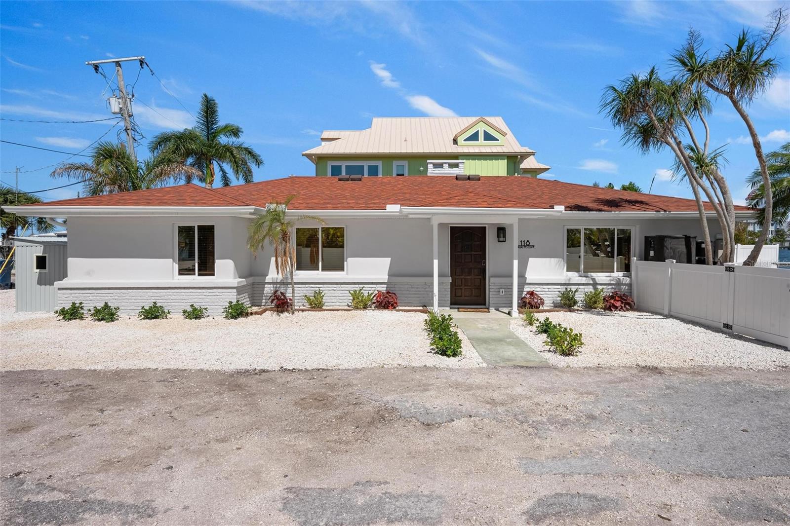Welcome to island living at its finest on beautiful Anna Maria Island! So much remodeled in this 3-bedroom, 2-bath waterfront retreat offering stunning full bay views, a private composite dock with water supply, seawall, and a sparkling saltwater pool with a heater and a cooling system designed for relaxing and entertaining. Tucked away at the end of a paved dead-end street, this property offers privacy, tropical landscaping, mature trees, and the ultimate coastal lifestyle.

Inside, the open-concept floor plan features luxury vinyl plank flooring, a dry bar, eating space in the kitchen, updated blinds, and beautifully renovated finishes throughout. The home underwent extensive renovations in 2025 and 2026, with a 2023 shingle roof already in place for peace of mind. Built with concrete exterior construction and stucco on a slab foundation, this property blends durability with modern coastal charm.

Best of all, this home is truly turnkey and fully furnished — everything conveys from the furniture, TVs, beds, appliances, washer and dryer, silverware, décor, and coffee makers! Just bring your suitcase and start enjoying island life immediately.

Step outside to your private backyard oasis complete with vinyl fencing around the pool area, irrigation system, outdoor grill, small storage shed, and multiple spaces to enjoy the waterfront scenery and coastal breezes.

Located with no HOA and no deed restrictions, this property also offers exceptional investment potential with weekly rentals permitted, making it an ideal vacation home, second home, or income-producing property. Public water, public sewer, and central heat and air complete the package.

Rarely does a move-in-ready waterfront property with this level of remodeling, furnishings, and rental flexibility become available on Anna Maria Island. Schedule your private showing today and experience the best of Florida Gulf Coast living!