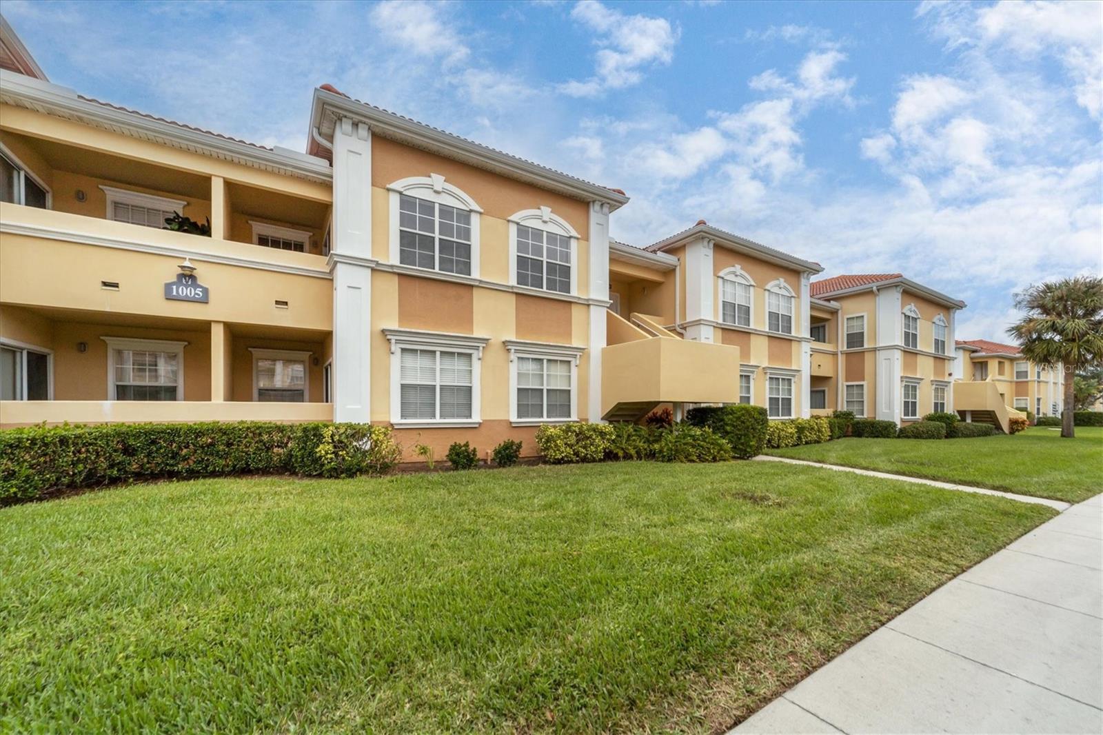 Are you looking for a lovely 1/1 condo, minutes away from the heart of the city of Sarasota? Look no further, this home could be yours. The top floor unit is conveniently situated in the front of the building, just a few steps away from the Villagio clubhouse and its beautiful amenities. You’ll love the high tray ceilings in the living room, right as you enter this open & bright condo. There is brand new plush carpet throughout, except in the kitchen and bathroom. The kitchen includes hardwood cabinets with plenty of storage space and updated stainless steel appliances. A breakfast bar makes it the perfect spot to entertain guests. Double doors lead to the master bedroom, which features an ample walk-in closet. The bathroom offers dual access from either the hallway or the bedroom. A laundry room off the kitchen with your own washer and dryer helps you keep all your cleaning tools organized. An office nook in the center of the unit lets you store your office gear neatly away or can be used as additional storage. Enjoy a cup of coffee in the morning on your covered lanai. Glass sliding doors bring in lots of natural light. This unit leaves nothing to wish for, the AC was replaced in 2021 and a new hot water heater was installed in 2022. One deeded covered carport comes with the unit and will keep your car protected from the sun. The unit is nestled within the gated Villagio condominium association, minutes away from downtown Sarasota, shopping and the beautiful beaches, with easy access to 301, I75 and public transportation. Community amenities include a heated resort-style pool, tennis/pickleball court, fenced in dog park, playground and gym. All the tile roofs in the community were replaced in 2021. Low monthly dues make this a great place to make your new home, seasonal get away or rental property. Call to set up your showing or virtual tour today.