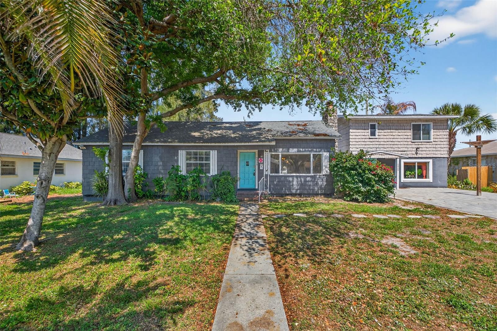 Exceptional income-producing opportunity with this versatile triplex property, ideal for both investors and owner-occupants alike. The main
residence offers 3 bedrooms and 1 full bath, featuring original hardwood floors, a spacious kitchen with stainless appliances, solid wood cabinets,
living/family room with a wood-burning fireplace, formal dining area, and a charming sunroom that fills the home with natural light. A fully
fenced backyard provides privacy and outdoor space perfect for relaxing or entertaining. The property resides on a large/ oversized lot and can potentially add a 4th unit to the property for additional rental income (pending the city's approval).In addition to the main home, the property includes two
separate 1-bedroom, 1-bath units—each with a separate electric meter & private entrance offering comfortable living spaces and strong rental potential. A shared
community storage area with washer and dryer adds convenience for all occupants, along with a large attic space providing additional storage.
The downstairs apartment offers flexible use as an in-law suite, private guest quarters, or a teen retreat, while also presenting an excellent
opportunity for supplemental rental income. Whether you’re looking to offset your mortgage by living in the main home and leasing the
additional units, or seeking a fully income-generating investment, this property delivers both functionality and financial potential in one unique
package. Ideally situated just minutes from top-rated schools, a variety of shopping and dining options, and the vibrant energy of downtown St.
Petersburg. Commuting is a breeze with quick access to I-275, connecting you seamlessly throughout the Tampa Bay area. Plus, you’re just a
short drive from Florida’s award-winning Gulf beaches, where you can soak in the sun, sand, and coastal lifestyle year-round.