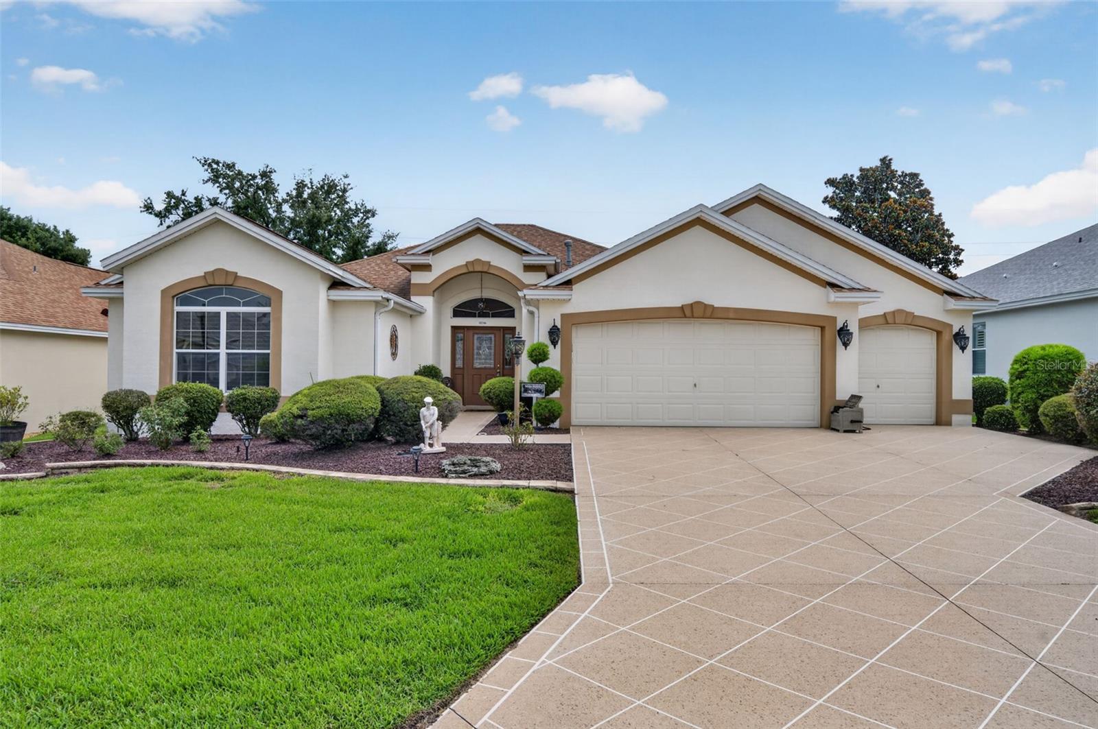 Turnkey Furnished Golf Course Home in The Villages! Wake up to beautiful golf course views from this well-maintained 3-bedroom, 2-bath home ideally situated in one of The Villages’ most desirable locations. Whether you’re looking for a full-time residence, seasonal getaway, or investment opportunity, this move-in-ready home offers comfort, convenience, and a fantastic lifestyle. Inside, you’ll find a spacious open floor plan with ceramic tile flooring throughout, creating a clean, low-maintenance living space. The kitchen features stainless steel appliances, a gas range, and plenty of cabinet space. Natural light fills the oversized lanai, making it the perfect place to enjoy your morning coffee, entertain guests or unwind while taking in the golf course scenery. Being sold turnkey, the home also includes the outdoor grill. The primary suite includes a walk-in shower, while one guest bedroom is equipped with a convenient Murphy bed, allowing for flexible use as a guest room or home office. An additional guest bedroom provides comfortable accommodations for family and friends.  Epoxy-coated garage floor and epoxy-coated driveway for enhanced durability and curb appeal.  Don’t miss this opportunity to own a beautifully furnished golf course home and start enjoying The Villages lifestyle from day one!